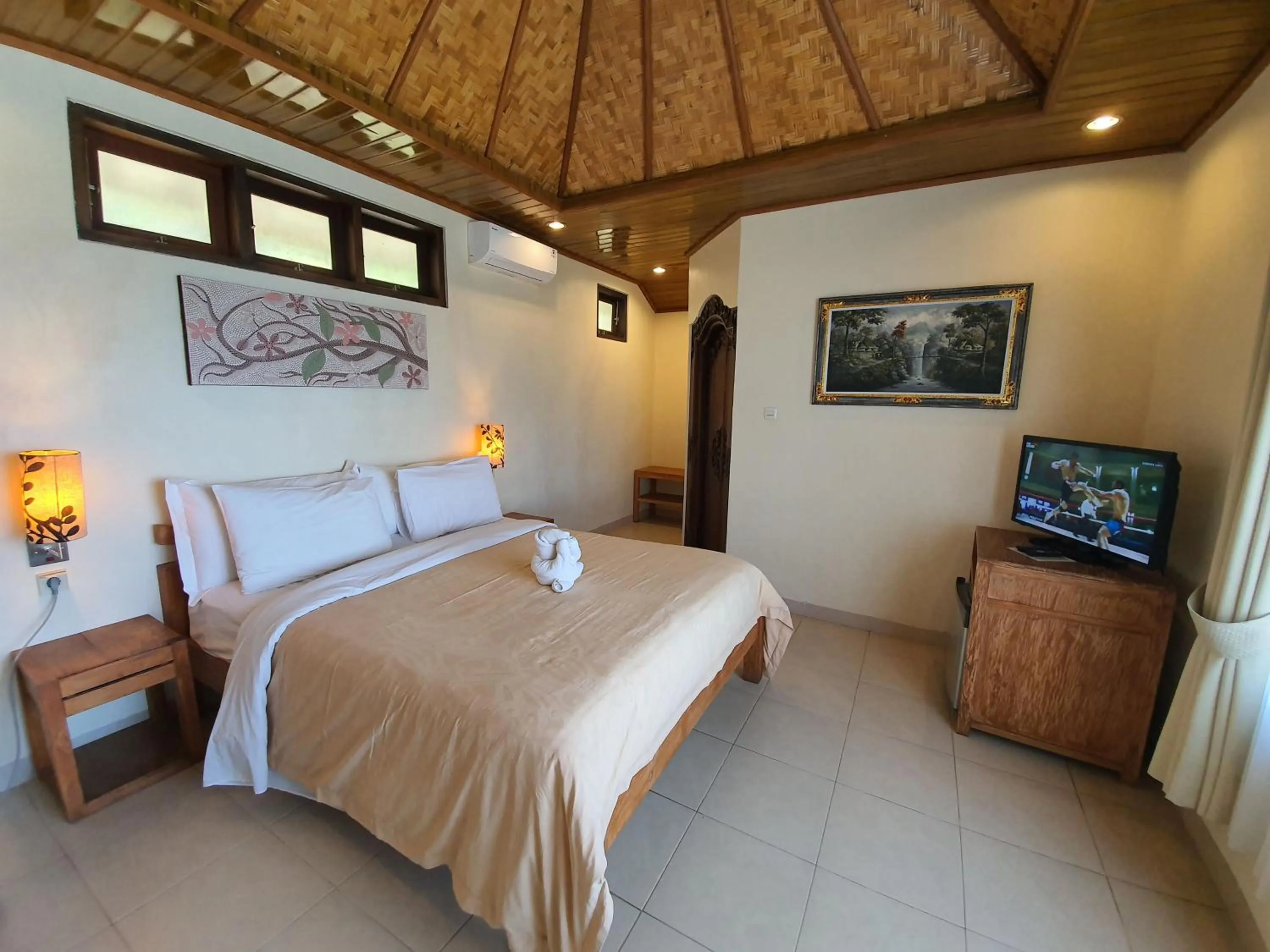 Bed in Hotel Genggong