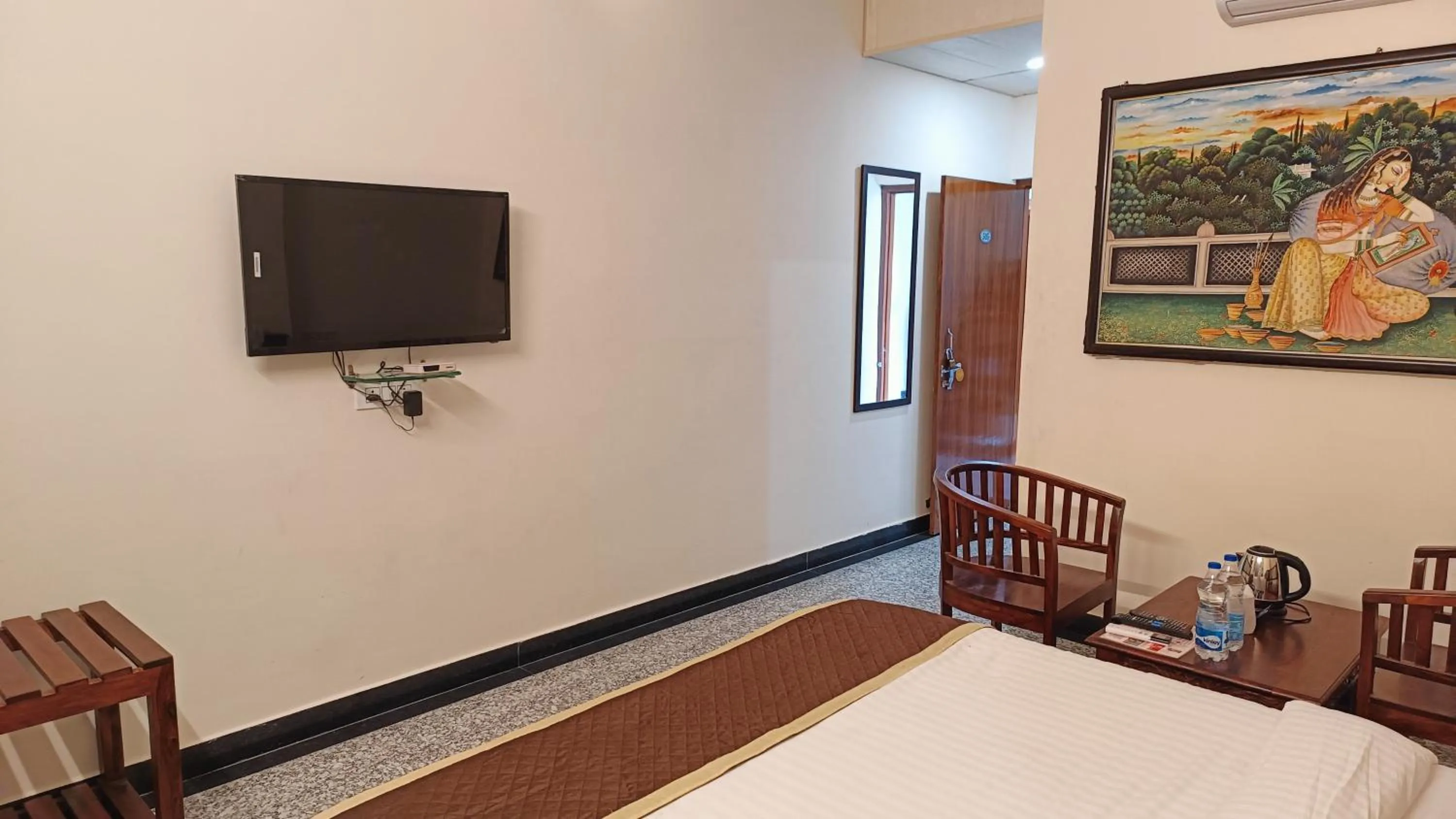 Communal lounge/ TV room, Bed in Teerth Palace Pushkar