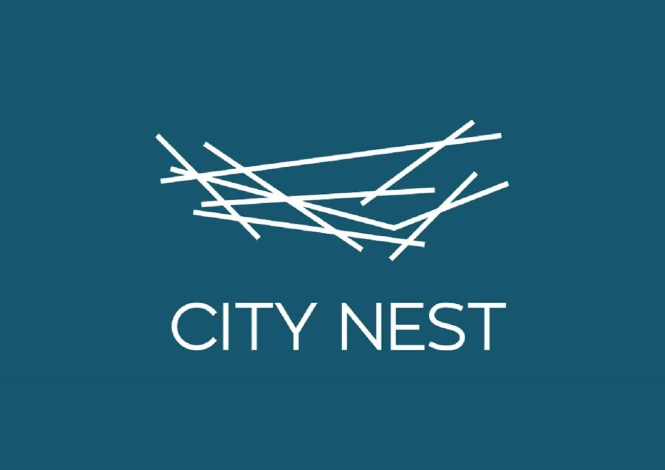Property logo or sign in City Nest Modern & Cozy Suites