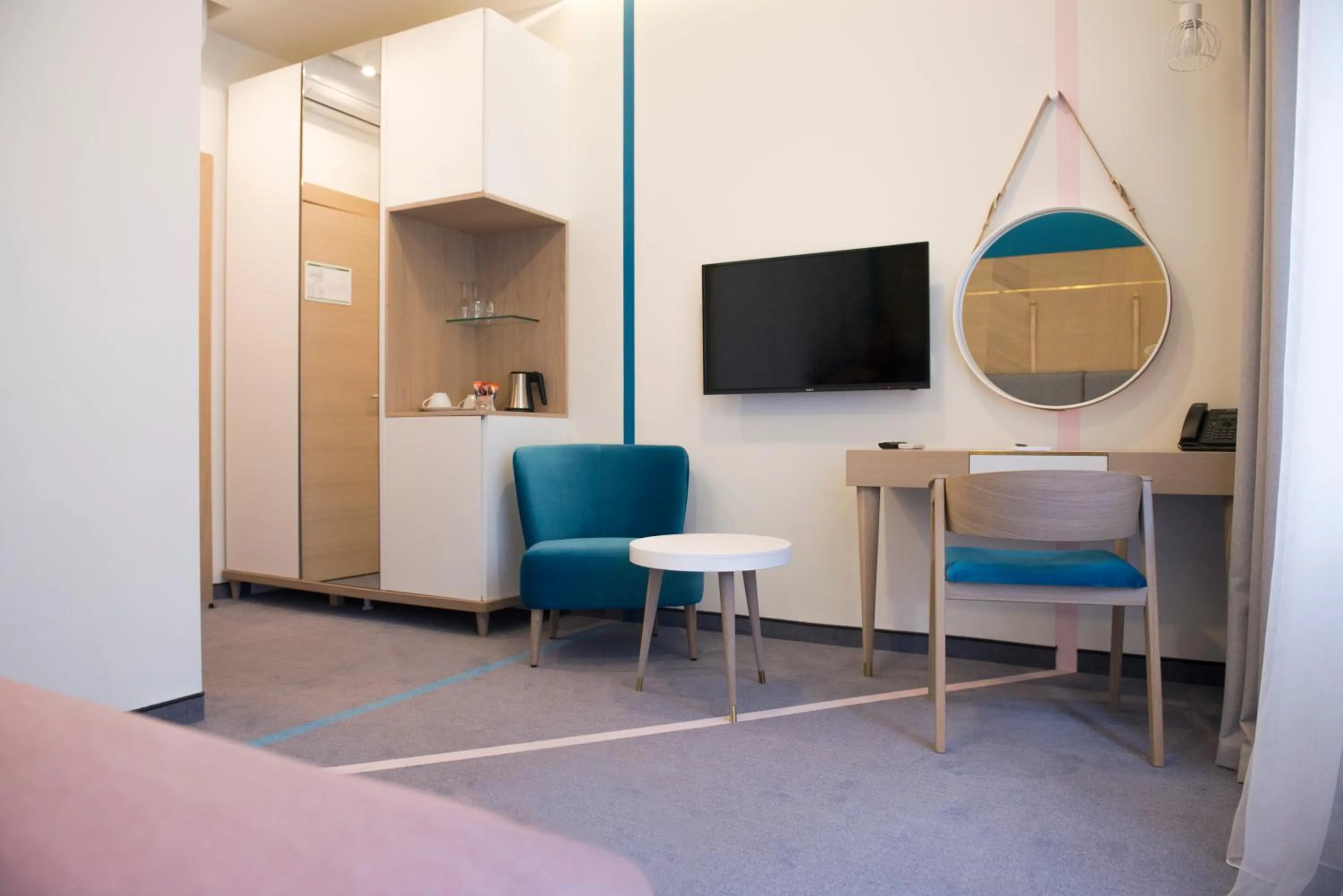 Bed in City Nest Modern & Cozy Suites