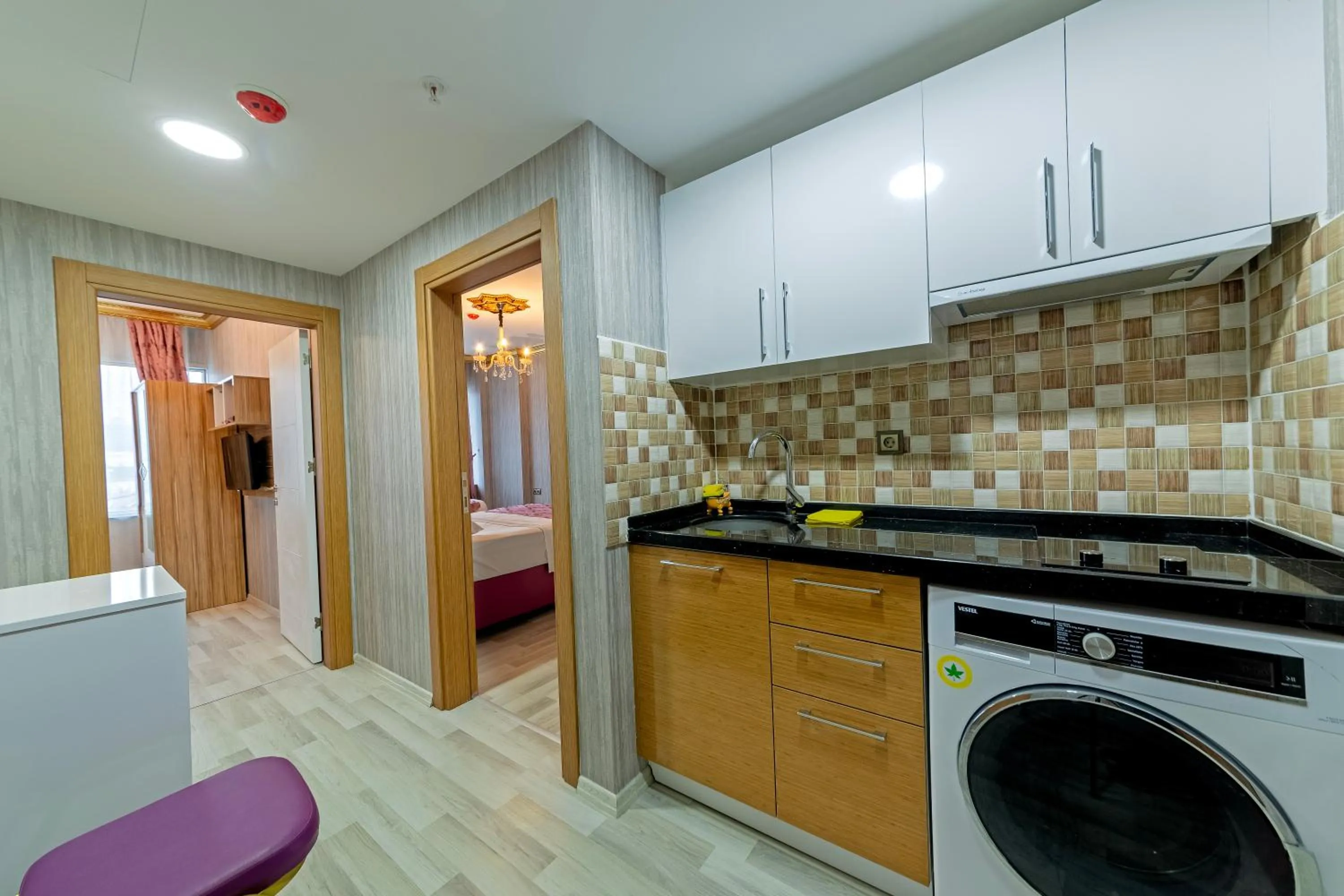 Kitchen or kitchenette in Royal Babil Suites Hotel