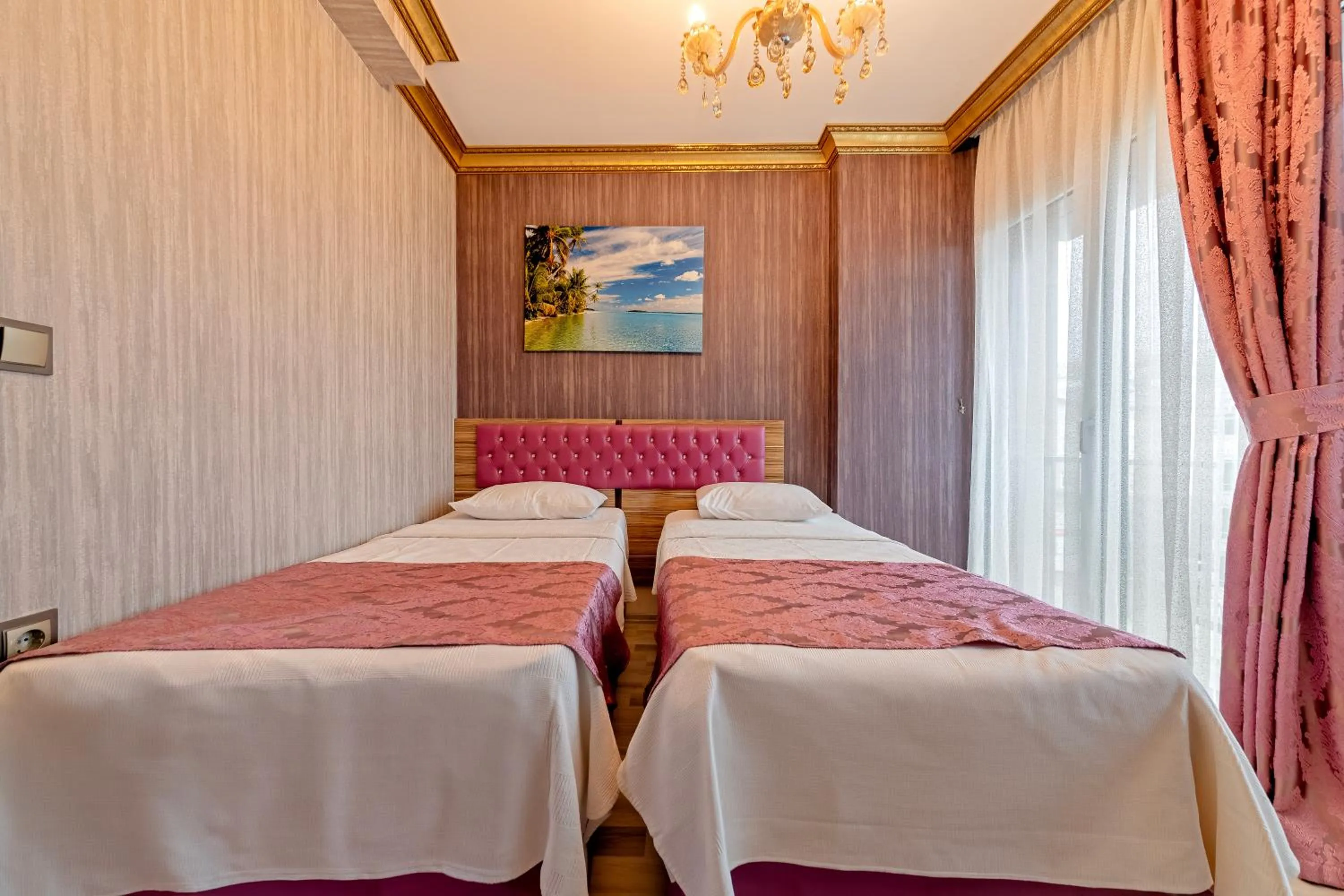 Bed in Royal Babil Suites Hotel