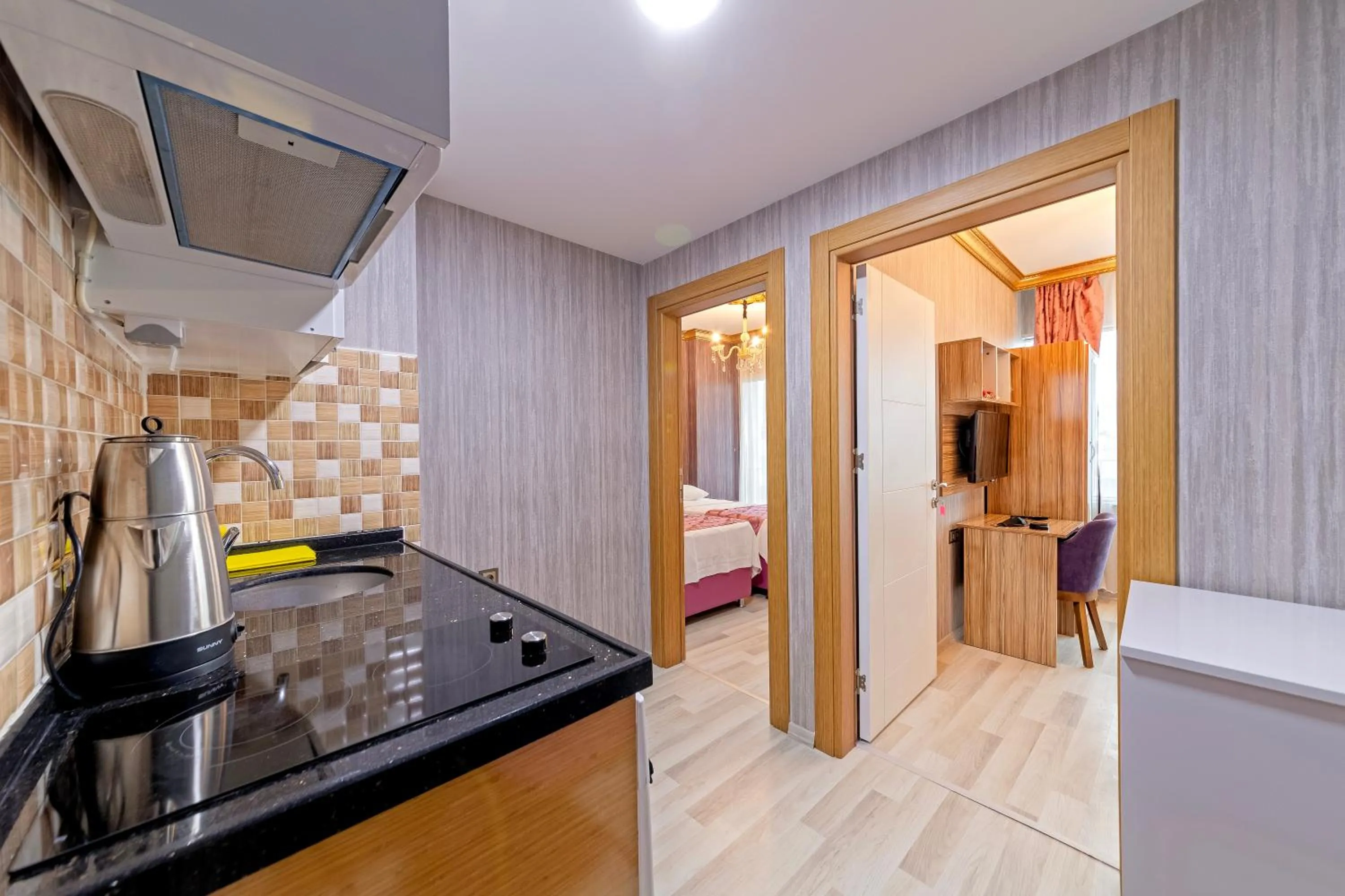 Bed in Royal Babil Suites Hotel