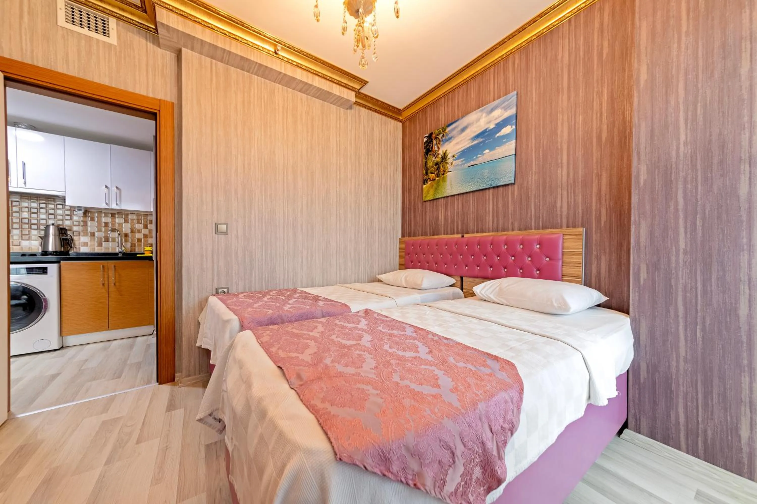 Bed in Royal Babil Suites Hotel