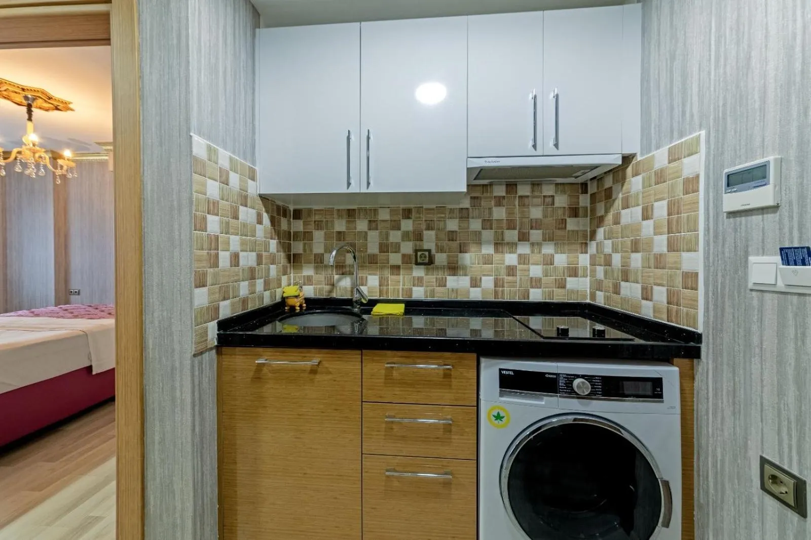 Kitchen or kitchenette in Royal Babil Suites Hotel