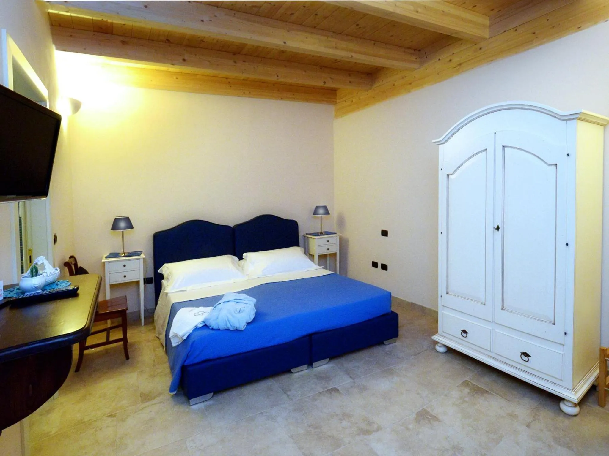 Photo of the whole room, Bed in Tenuta Monaci La Murra