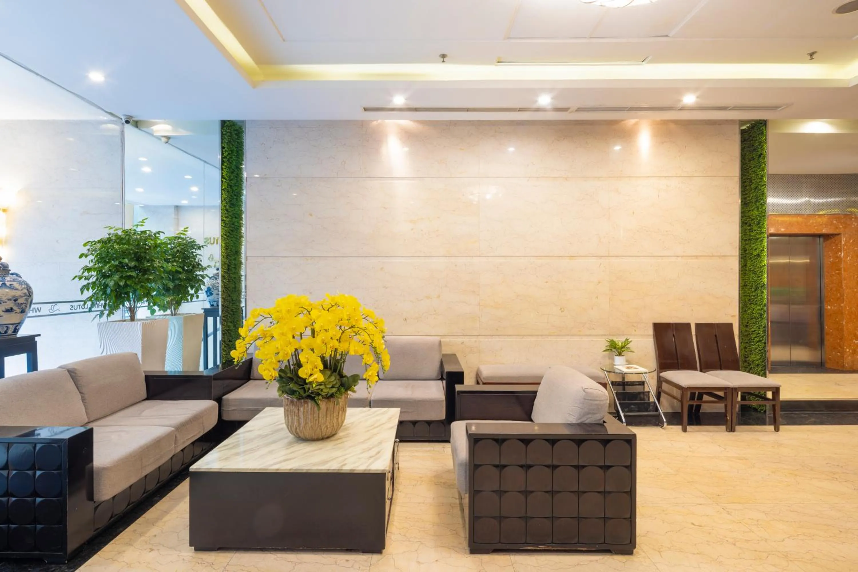 Seating area in White Lotus Hotel Saigon