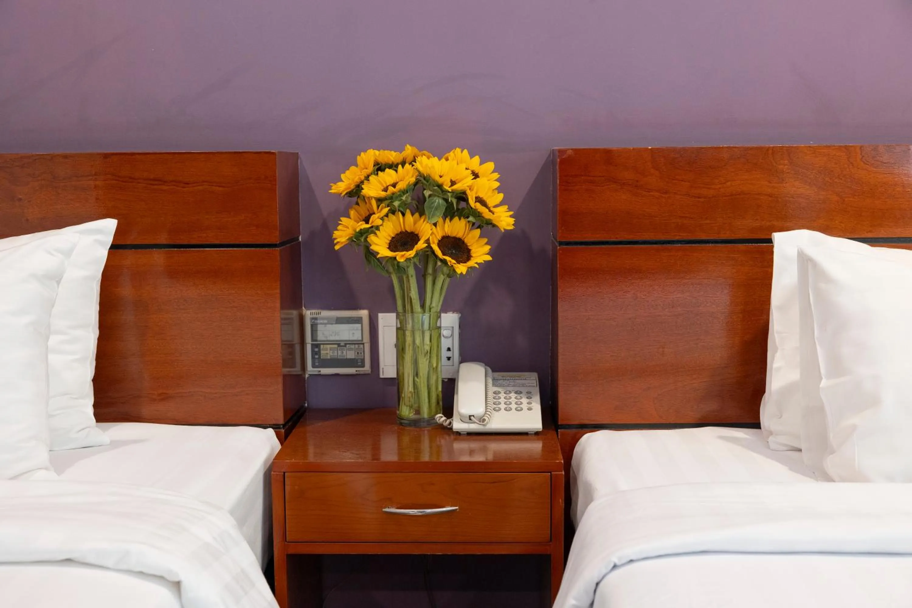 Bed in White Lotus Hotel Saigon