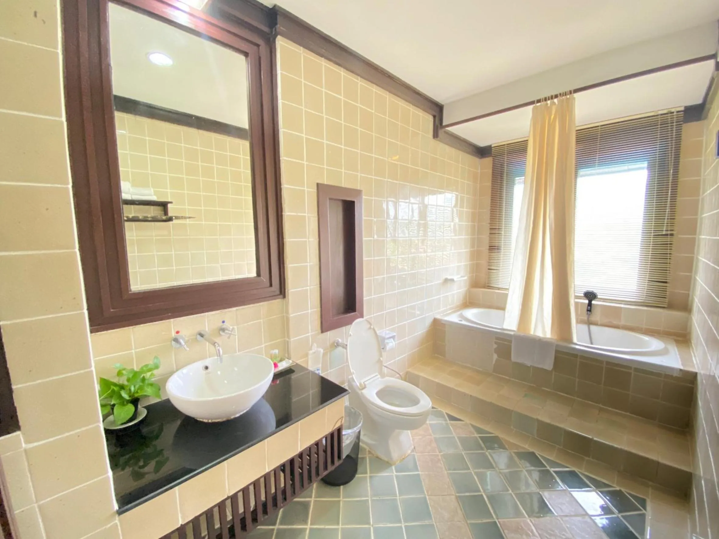 Bathroom in Gassan Khuntan Golf & Resort