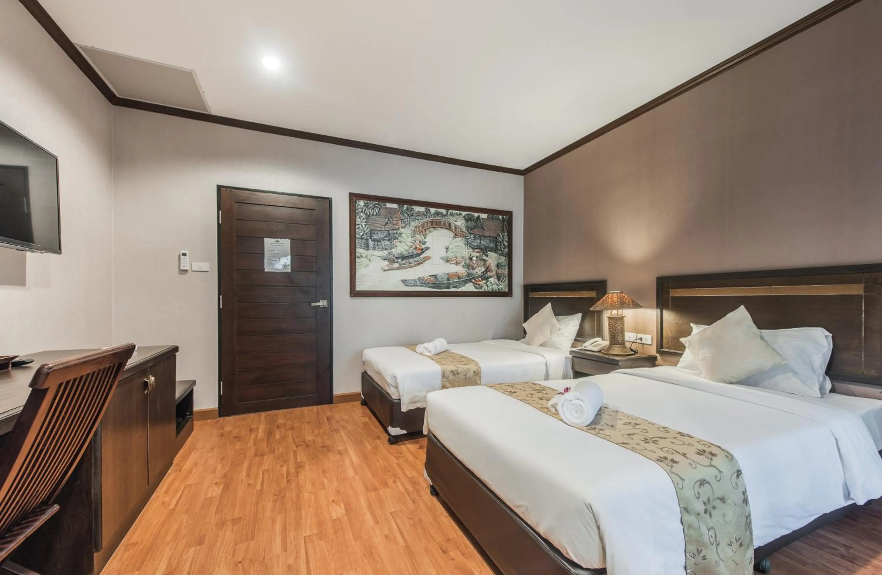 Bed in Gassan Khuntan Golf & Resort