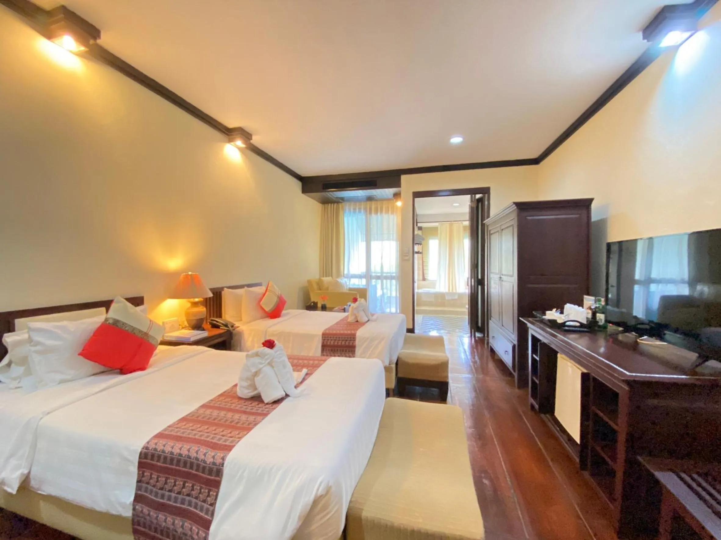 Photo of the whole room, Bed in Gassan Khuntan Golf & Resort