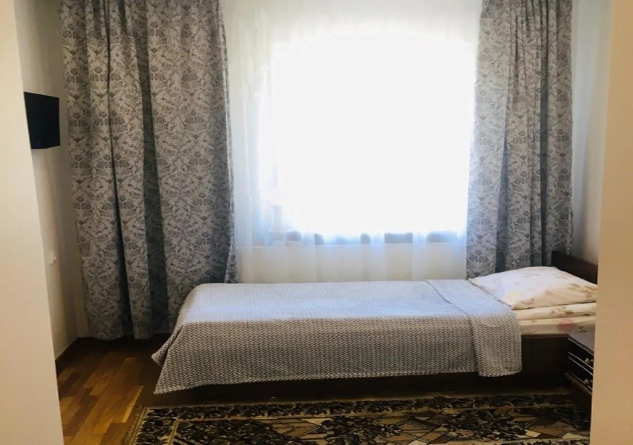 Communal lounge/ TV room, Bed in Apartamentai Laima