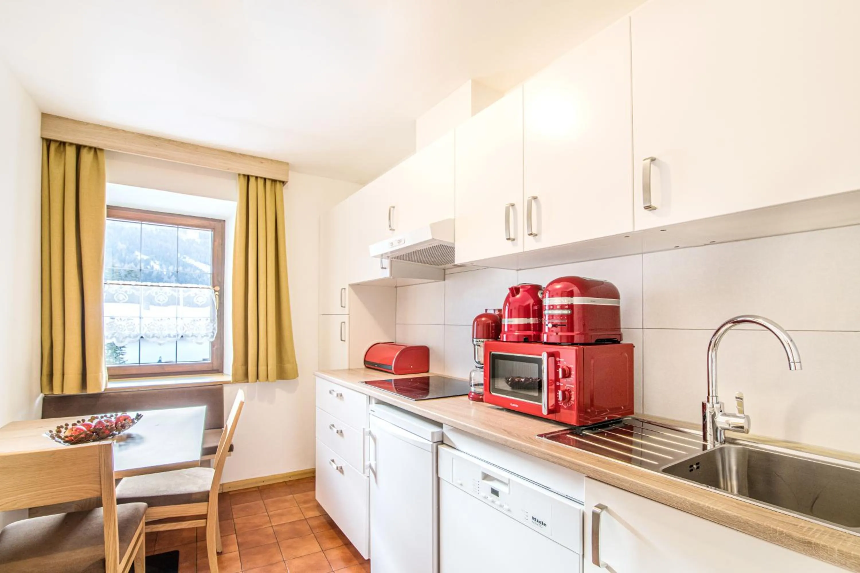 Kitchen or kitchenette in Apartments Heidenberger Fienili