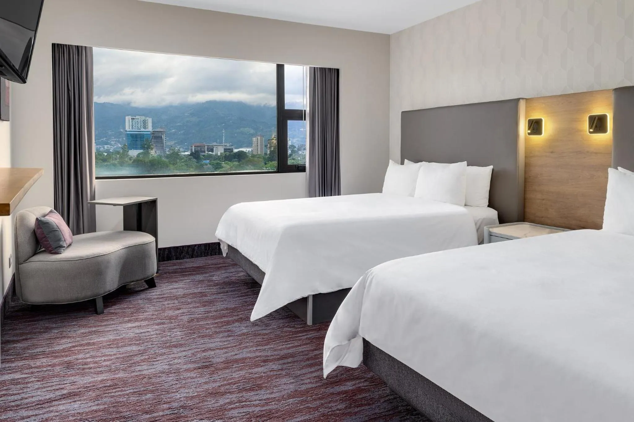 Photo of the whole room, Bed in Crowne Plaza San Jose La Sabana by IHG