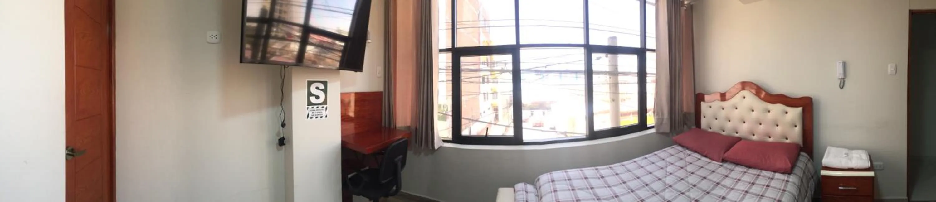 Bed in A-Hope Suite Hotel