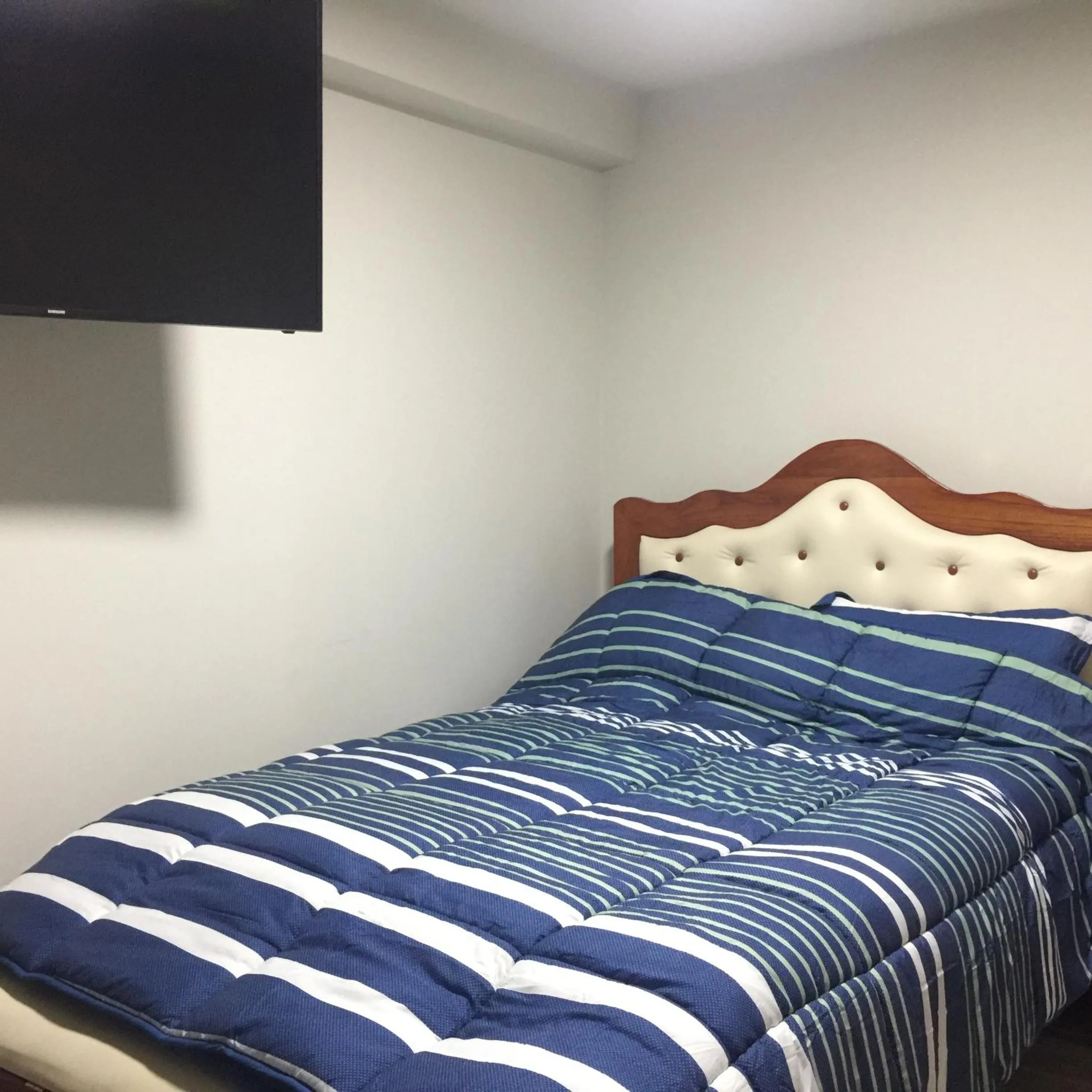 Bed in A-Hope Suite Hotel