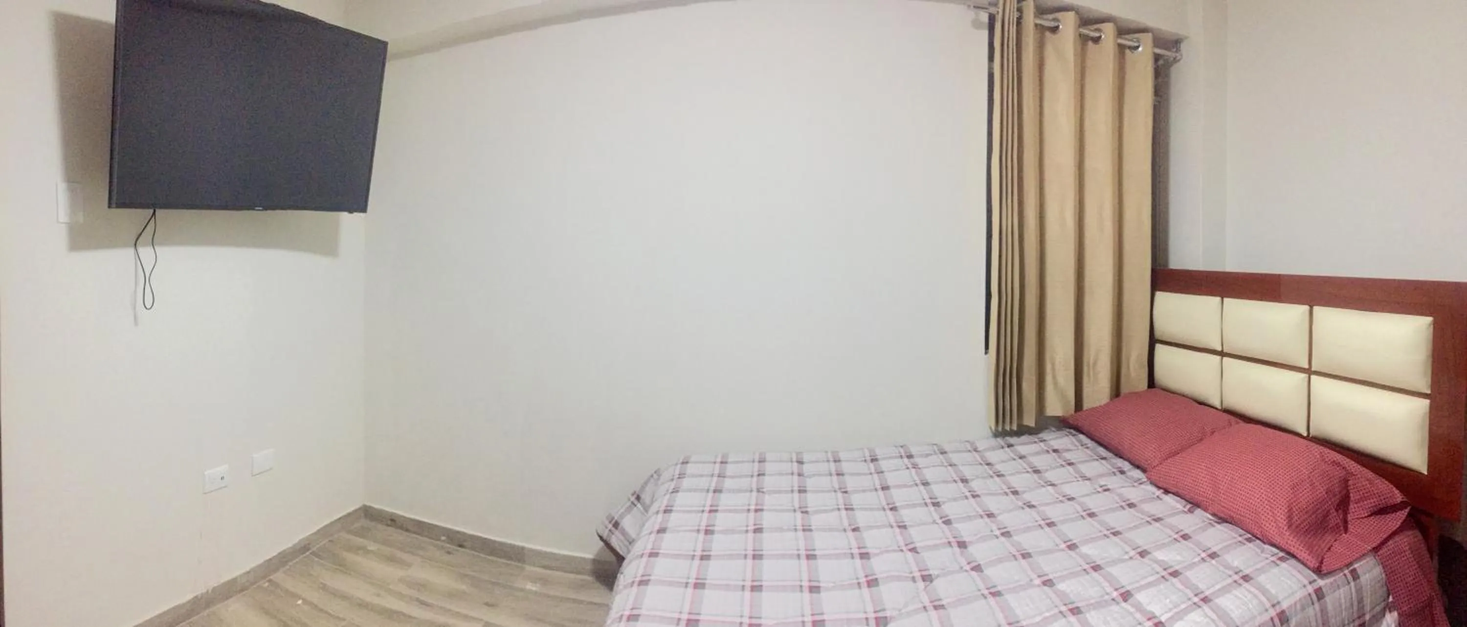 Bed in A-Hope Suite Hotel