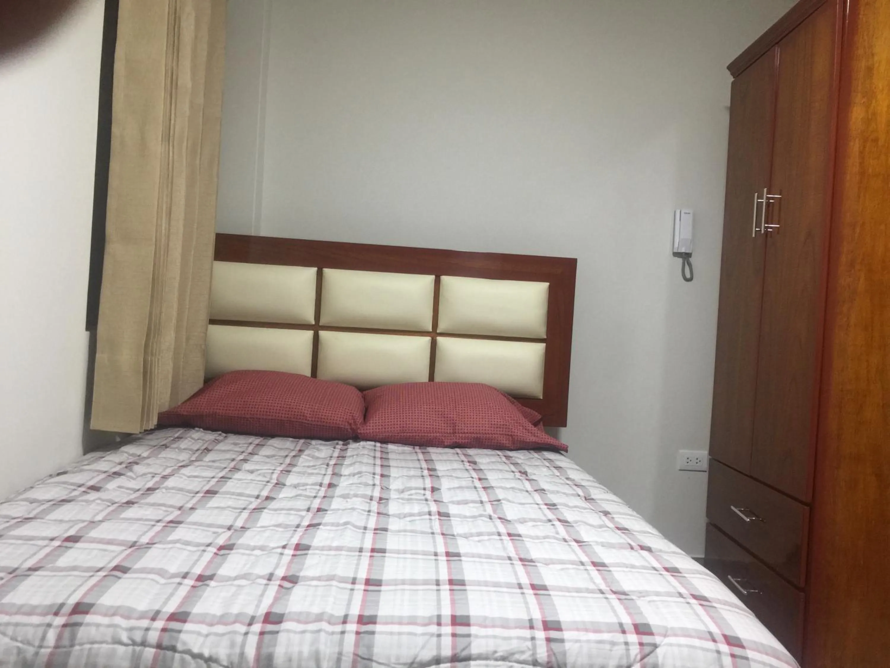 Bed in A-Hope Suite Hotel