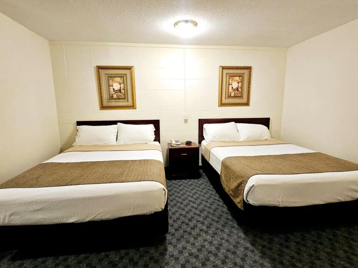 Bed in Canadian Motor Inn