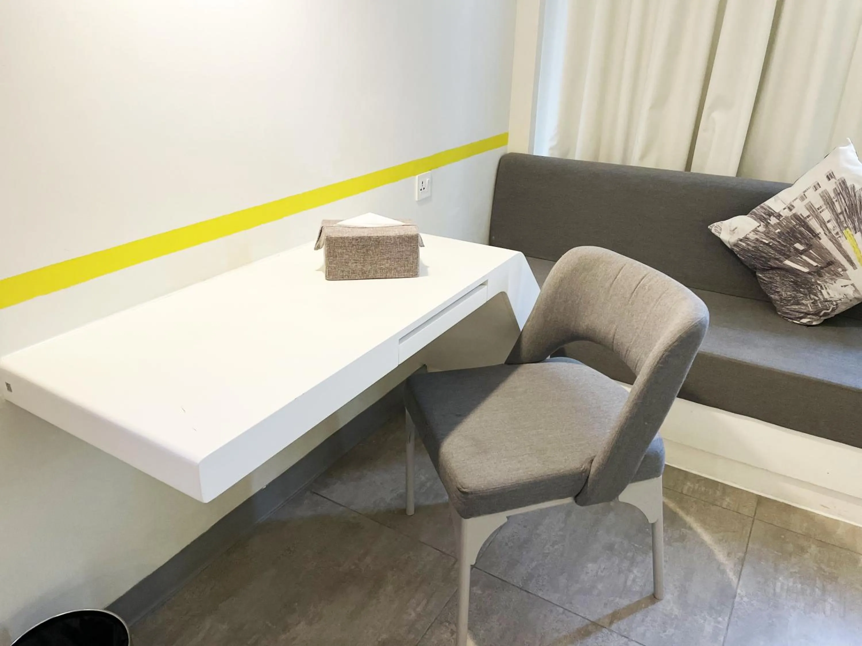 Seating area in YELLO Hotel Paskal Bandung