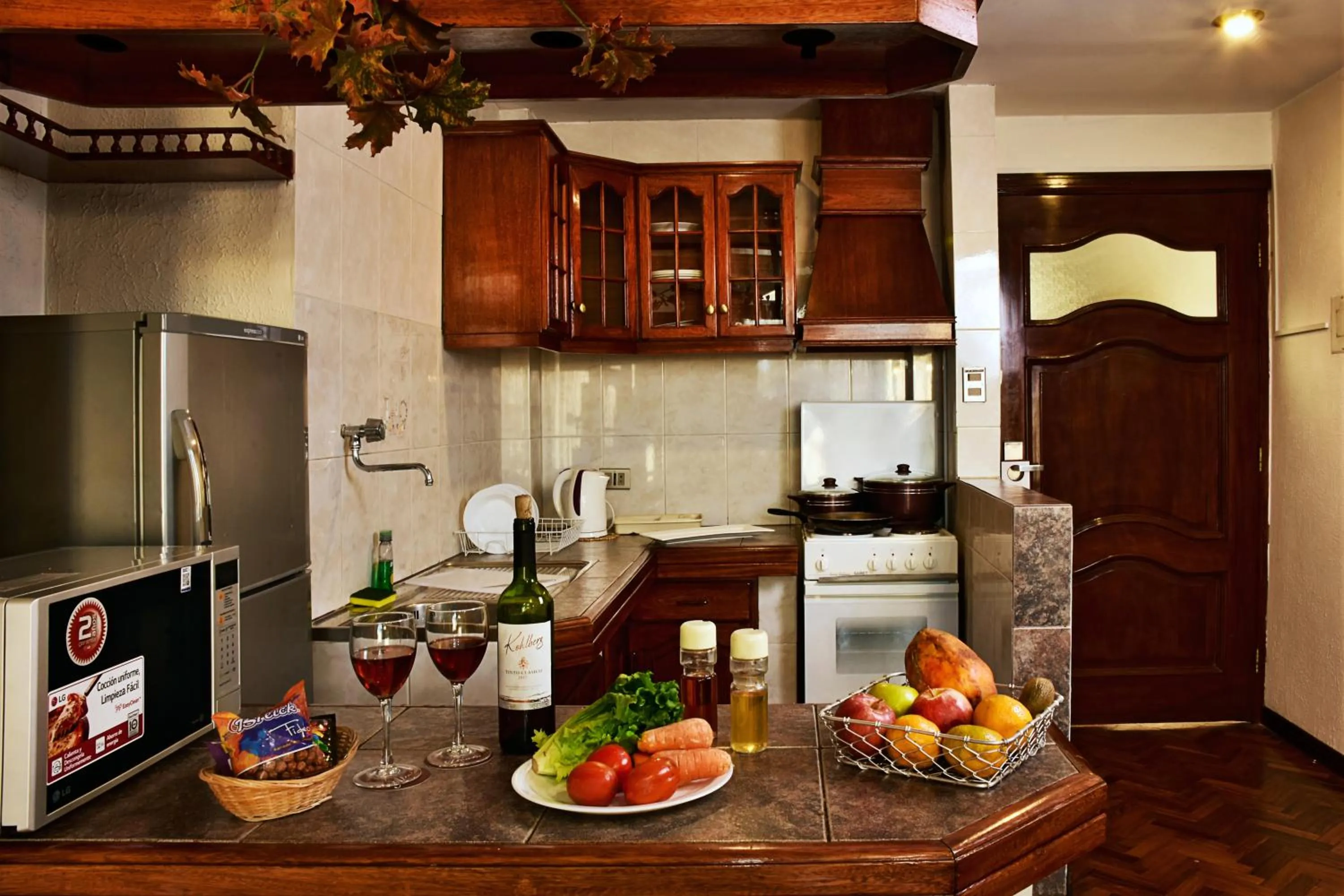 Kitchen or kitchenette in Alcalá Apart Hotel