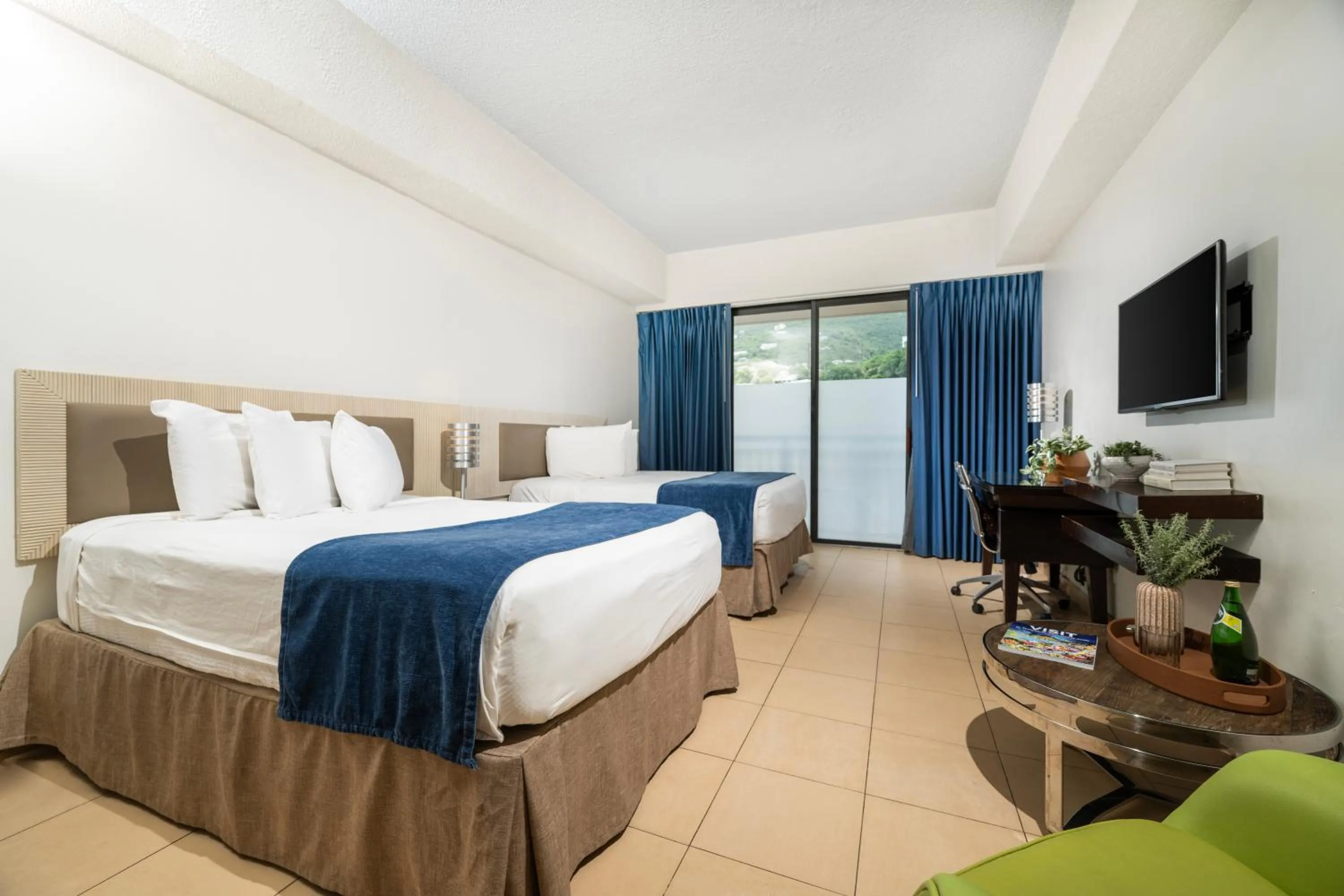 Bed in Windward Passage Hotel