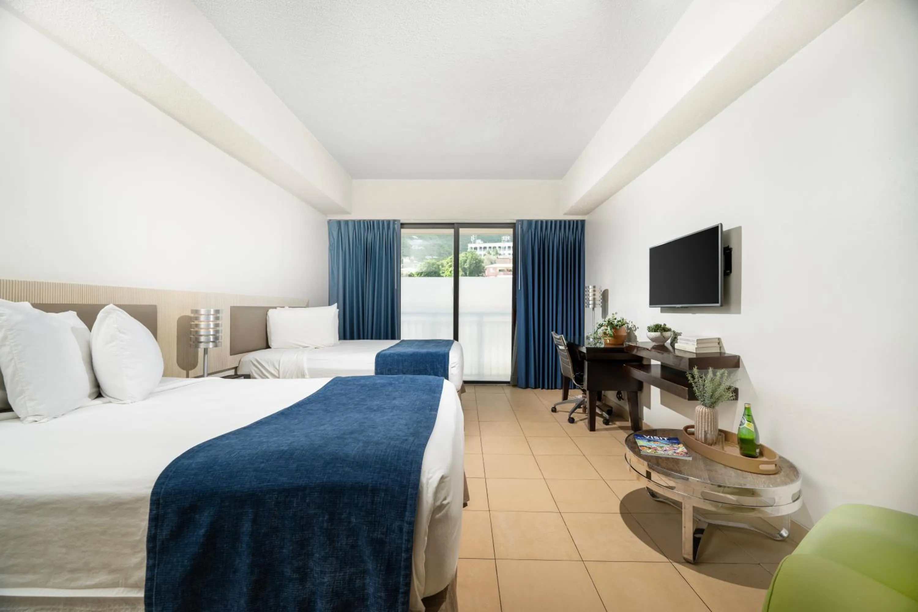 Bed in Windward Passage Hotel