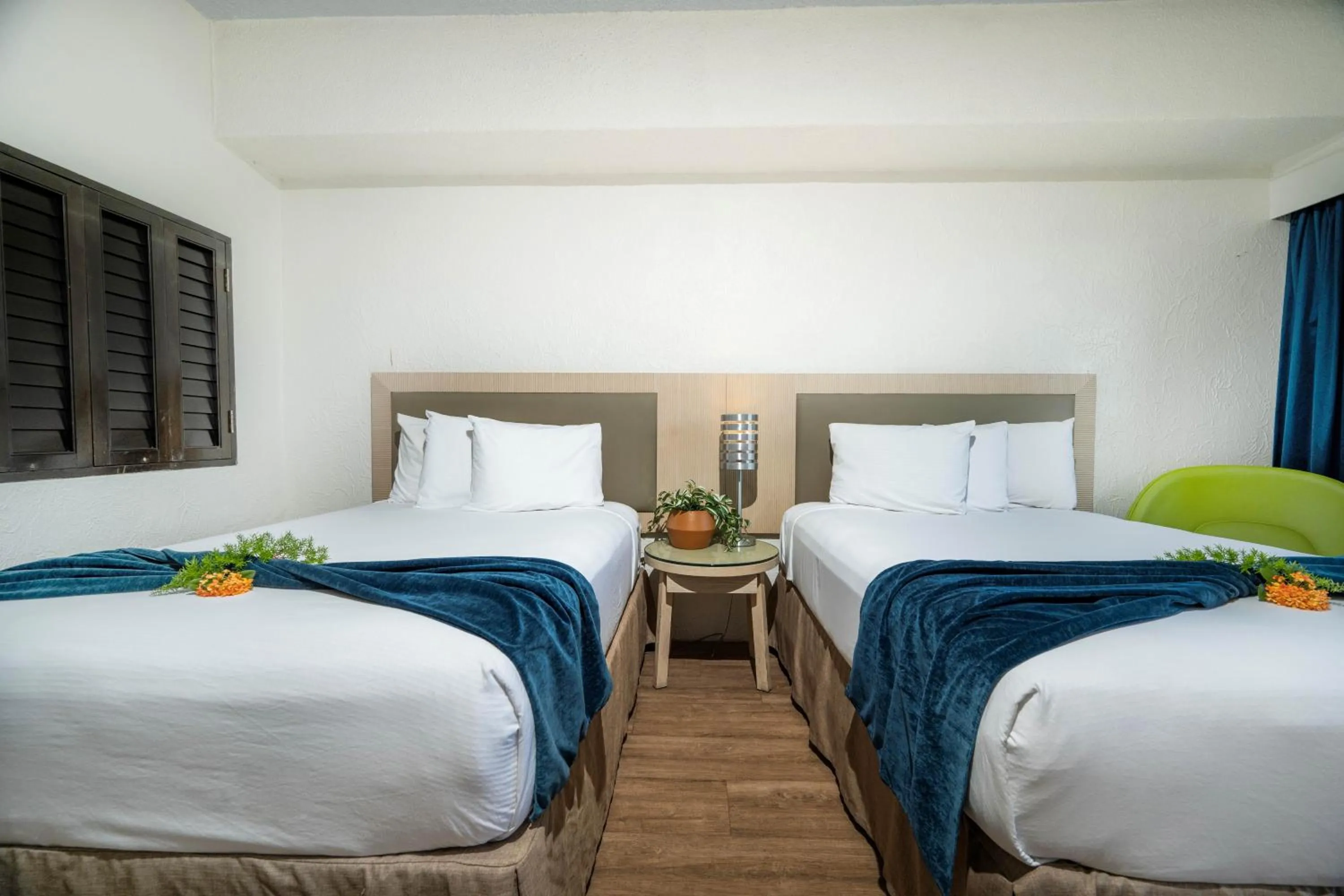 Bed in Windward Passage Hotel