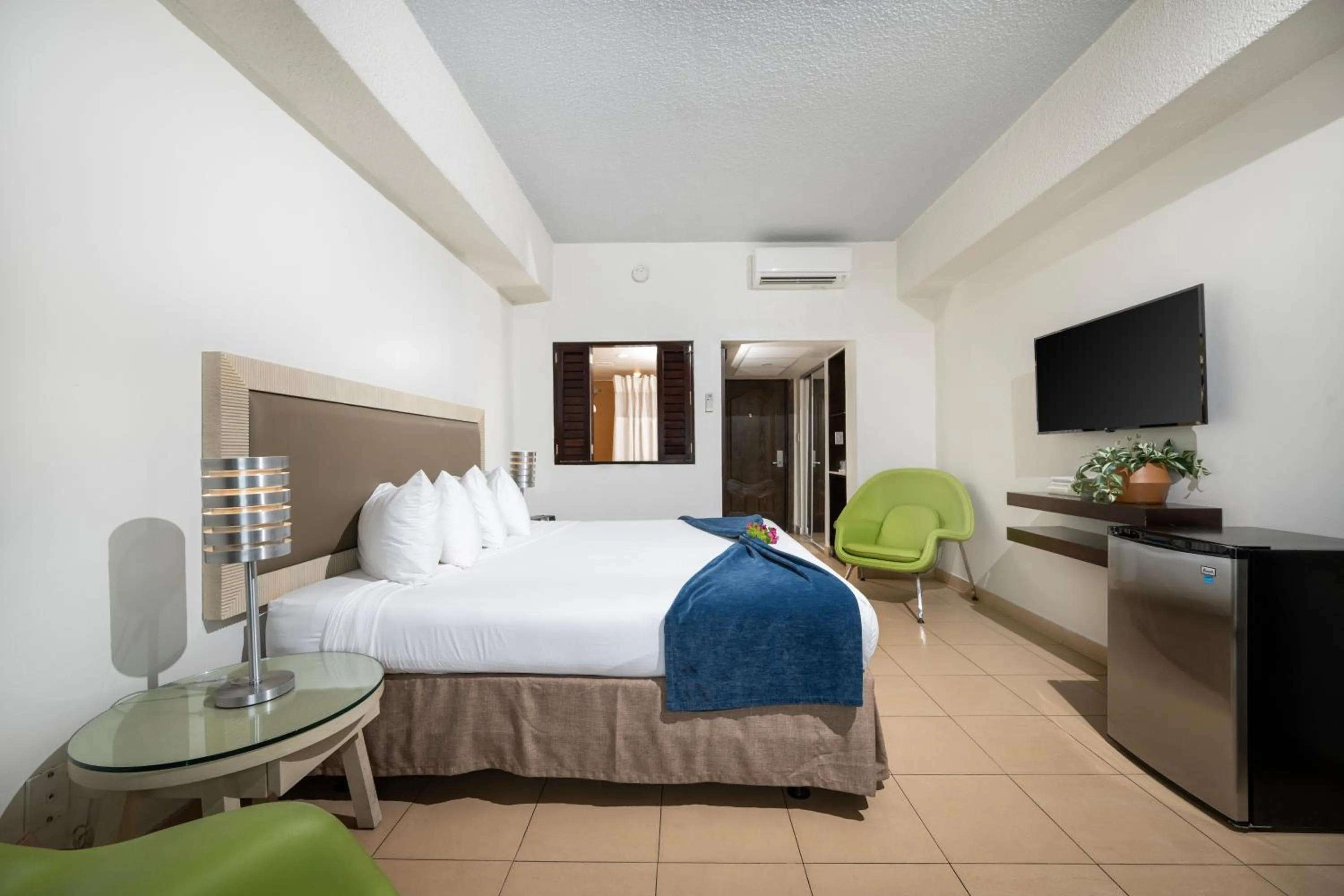 Bed in Windward Passage Hotel