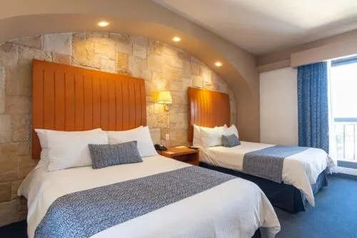 Bed in Hotel Flamingo Inn