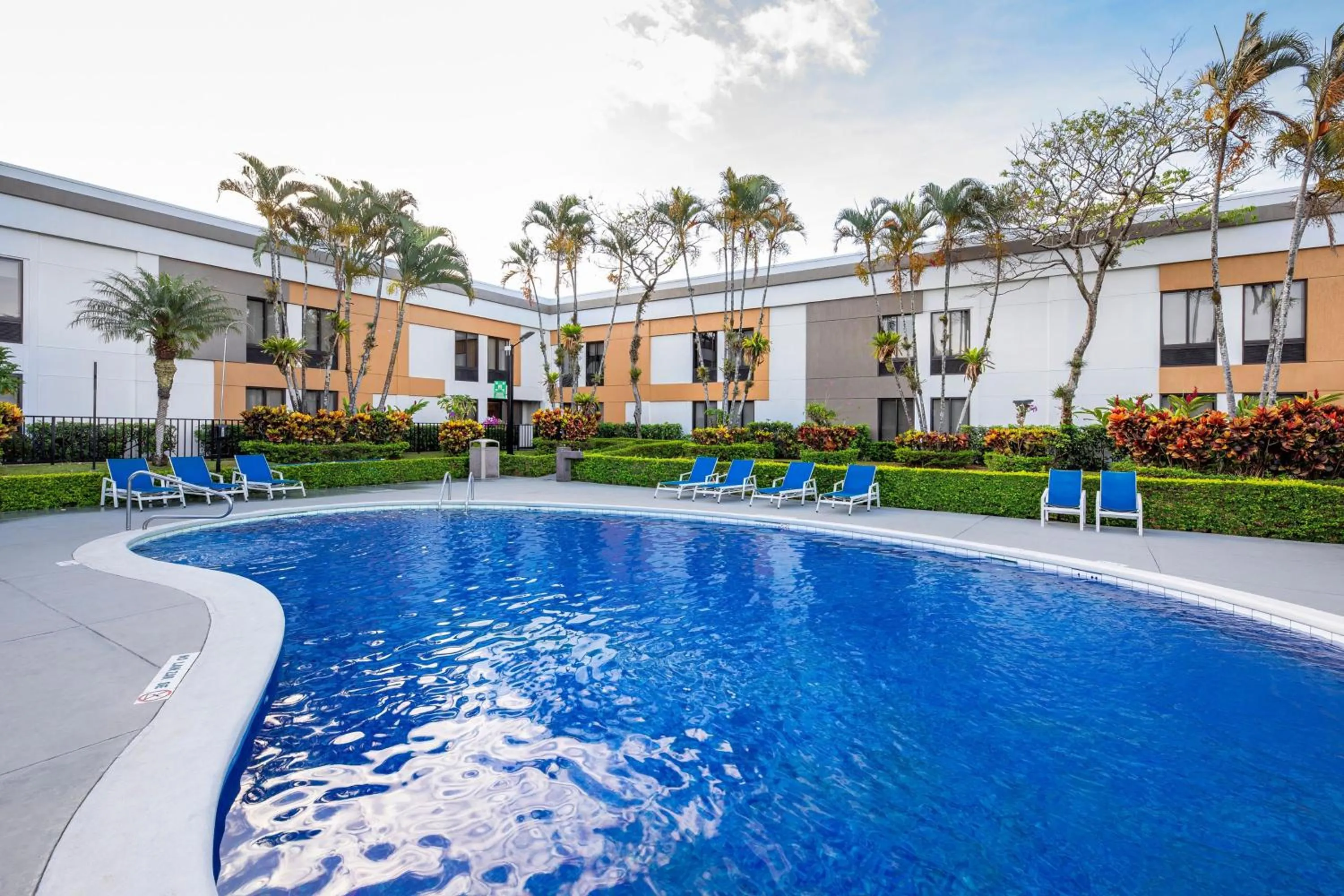 Swimming pool in Holiday Inn Express San Jose Costa Rica Airport by IHG