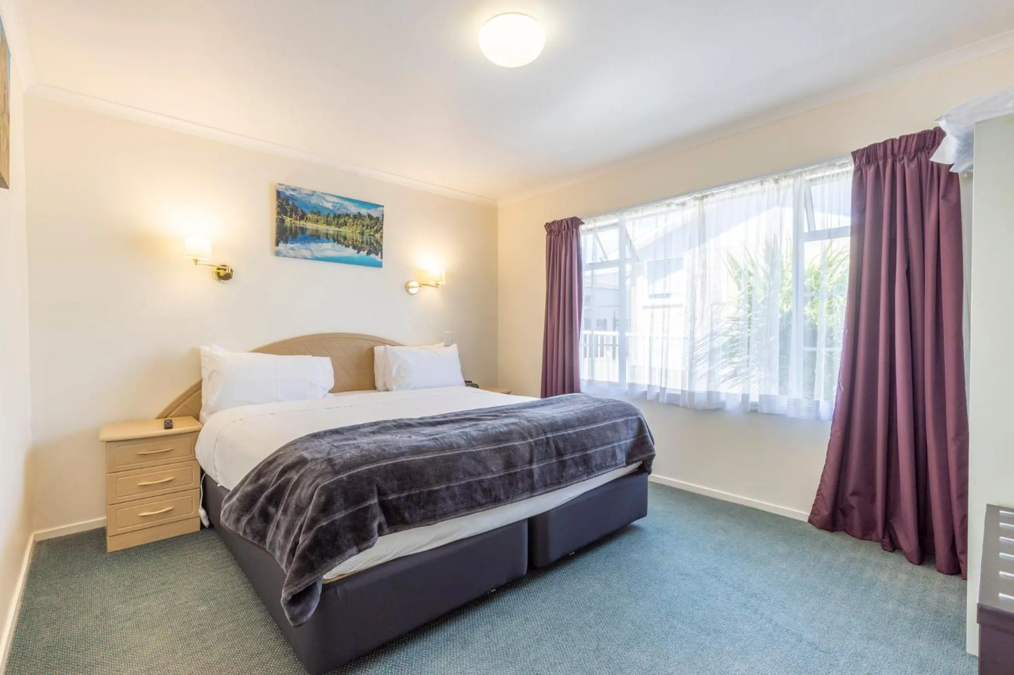 Bed in ASURE PRINCE motor lodge