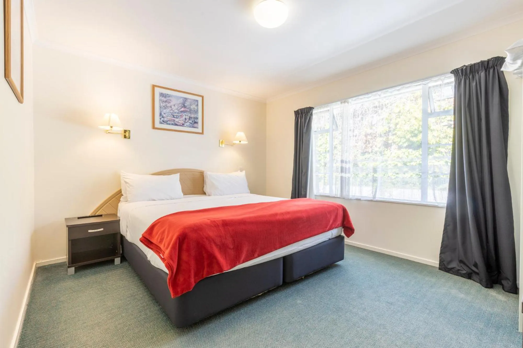 Bed in ASURE PRINCE motor lodge