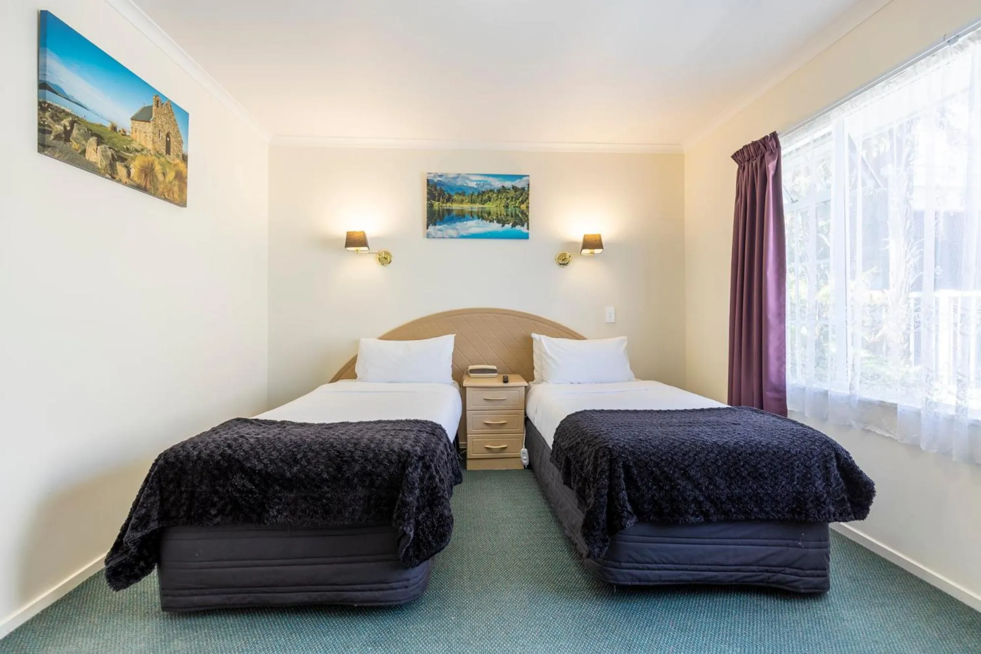 Bed in ASURE PRINCE motor lodge