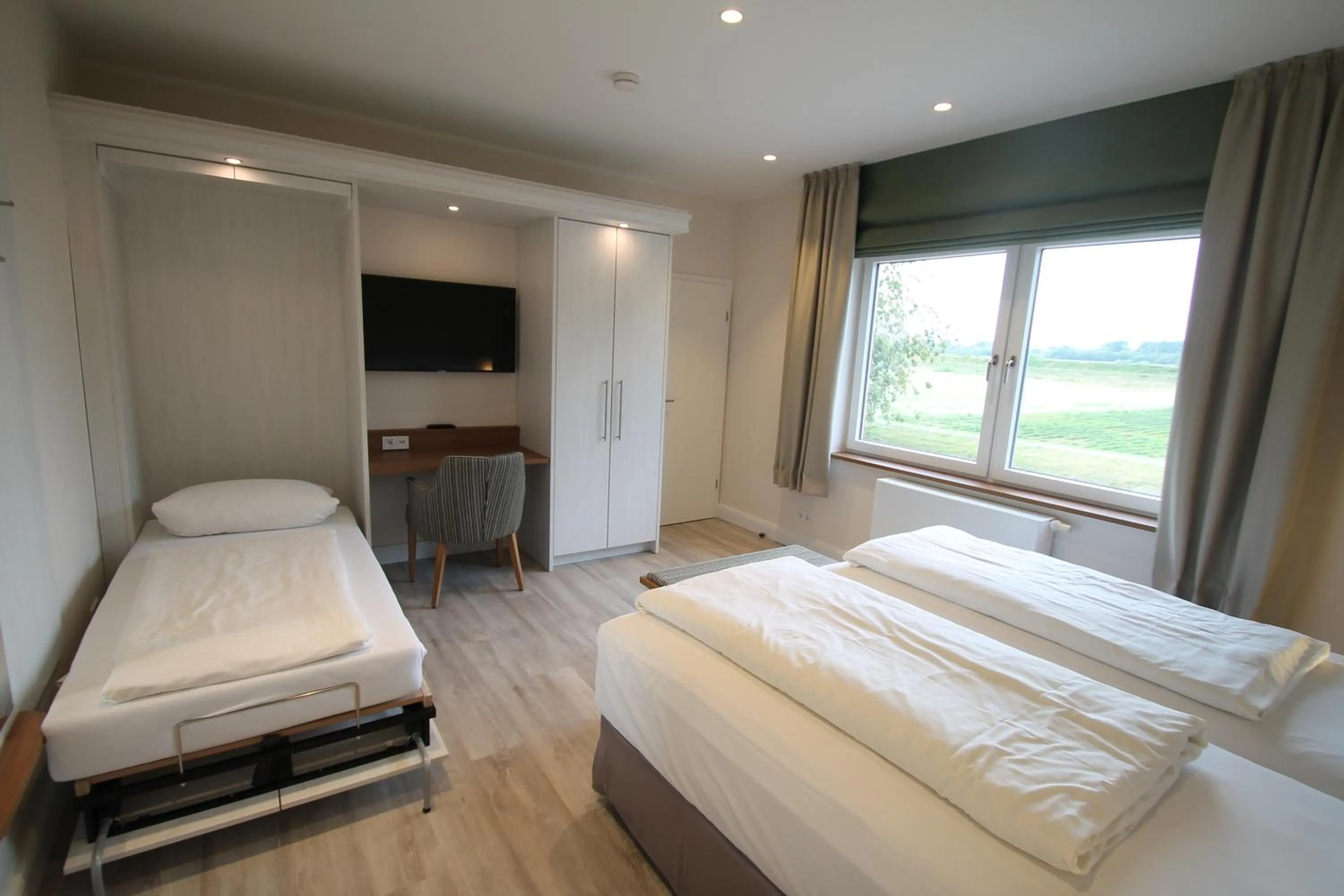 Bed in Bundt's Hotel & Gartenrestaurant