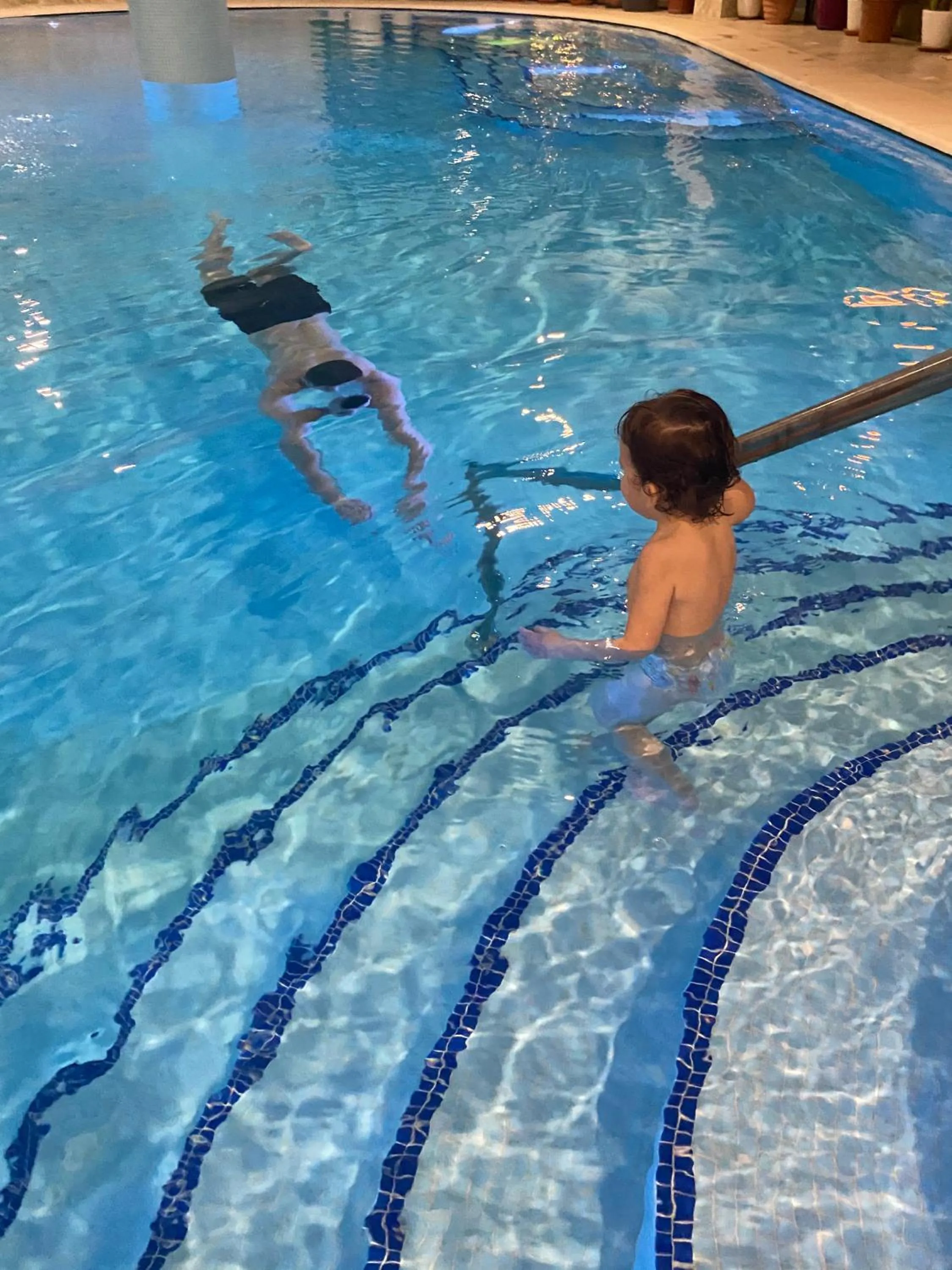 People in Resort Plaza Lake