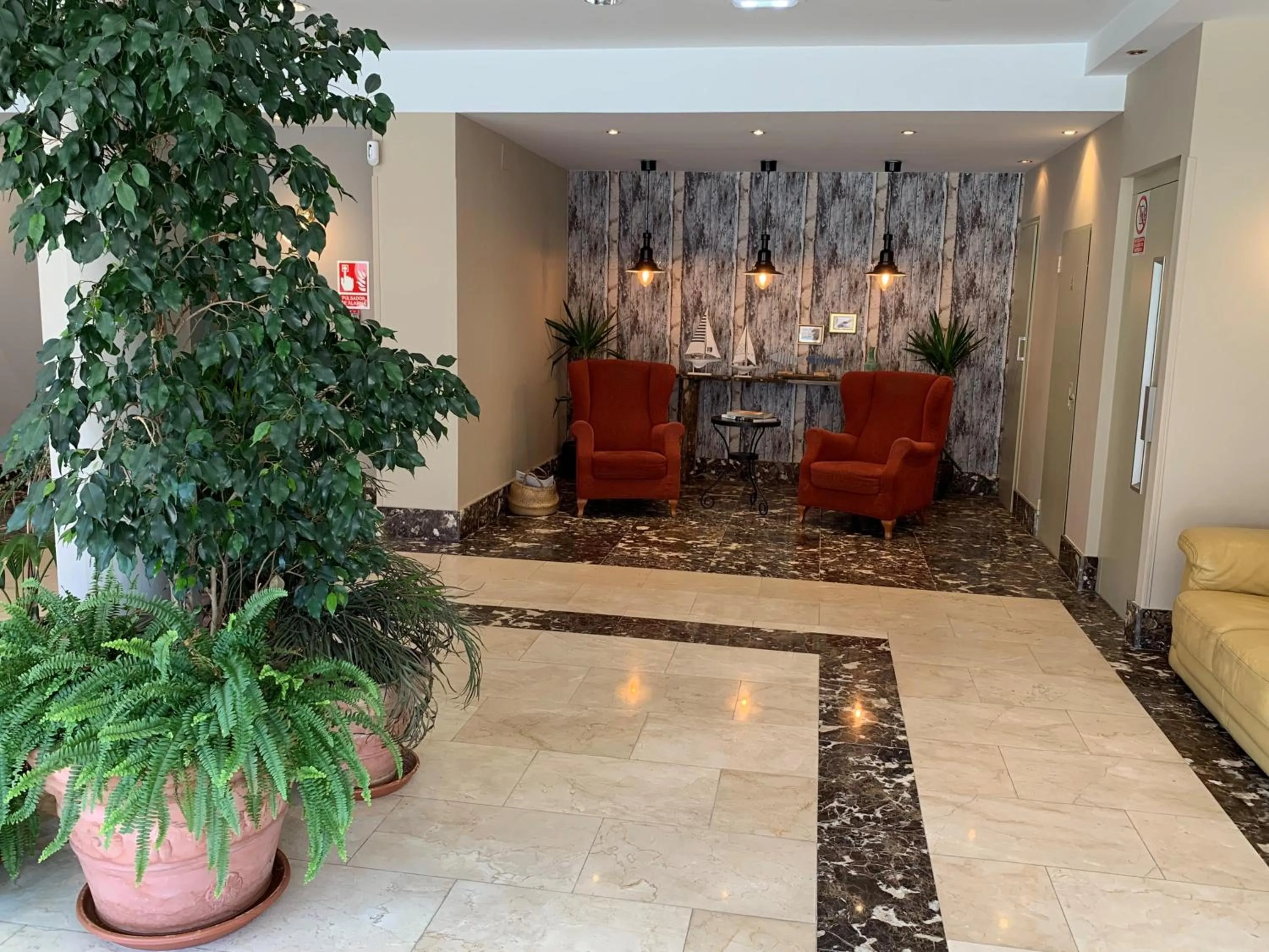 Lobby or reception in Hotel Arcea Villaviciosa
