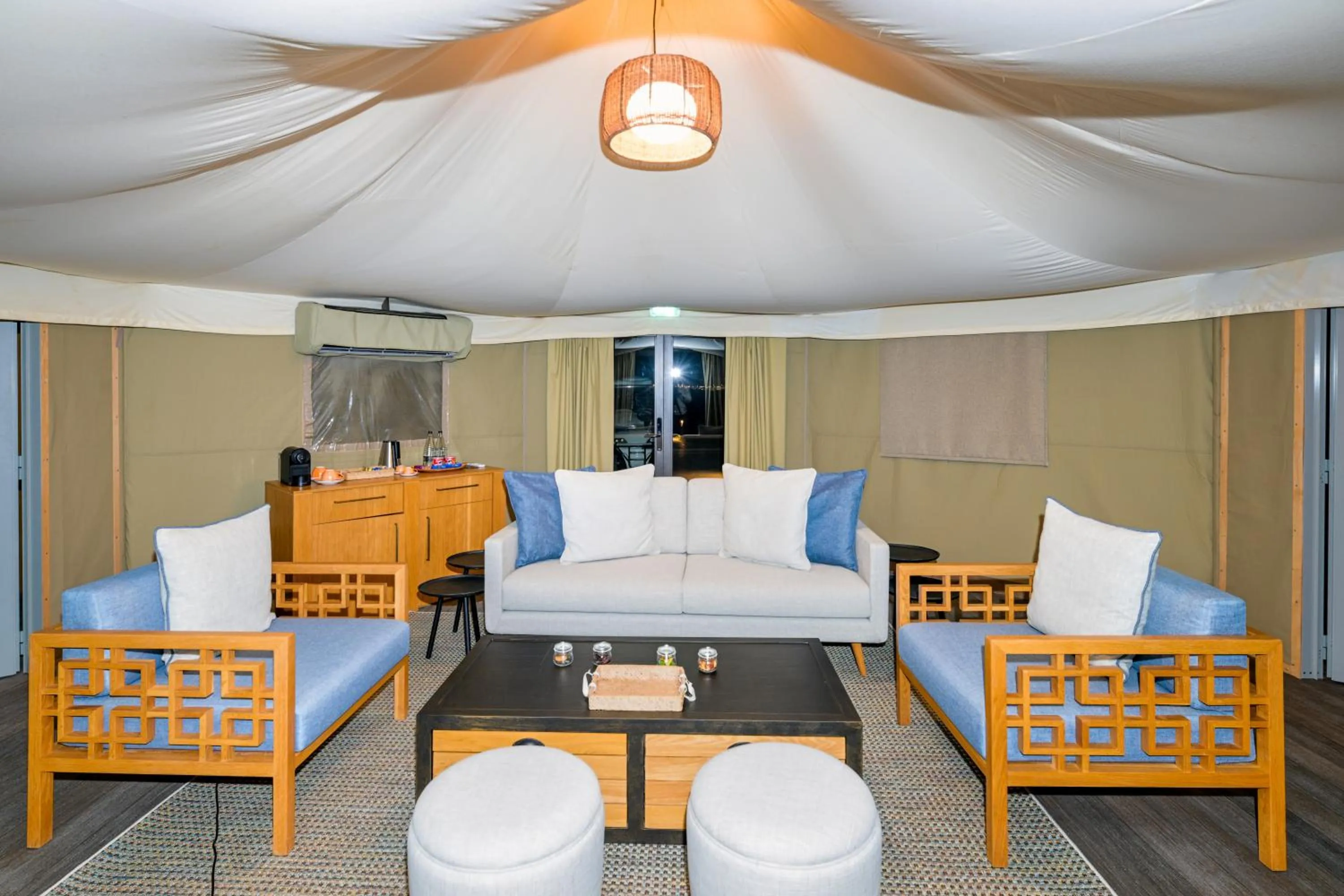 Living room in Kingfisher Retreat by Sharjah Collection