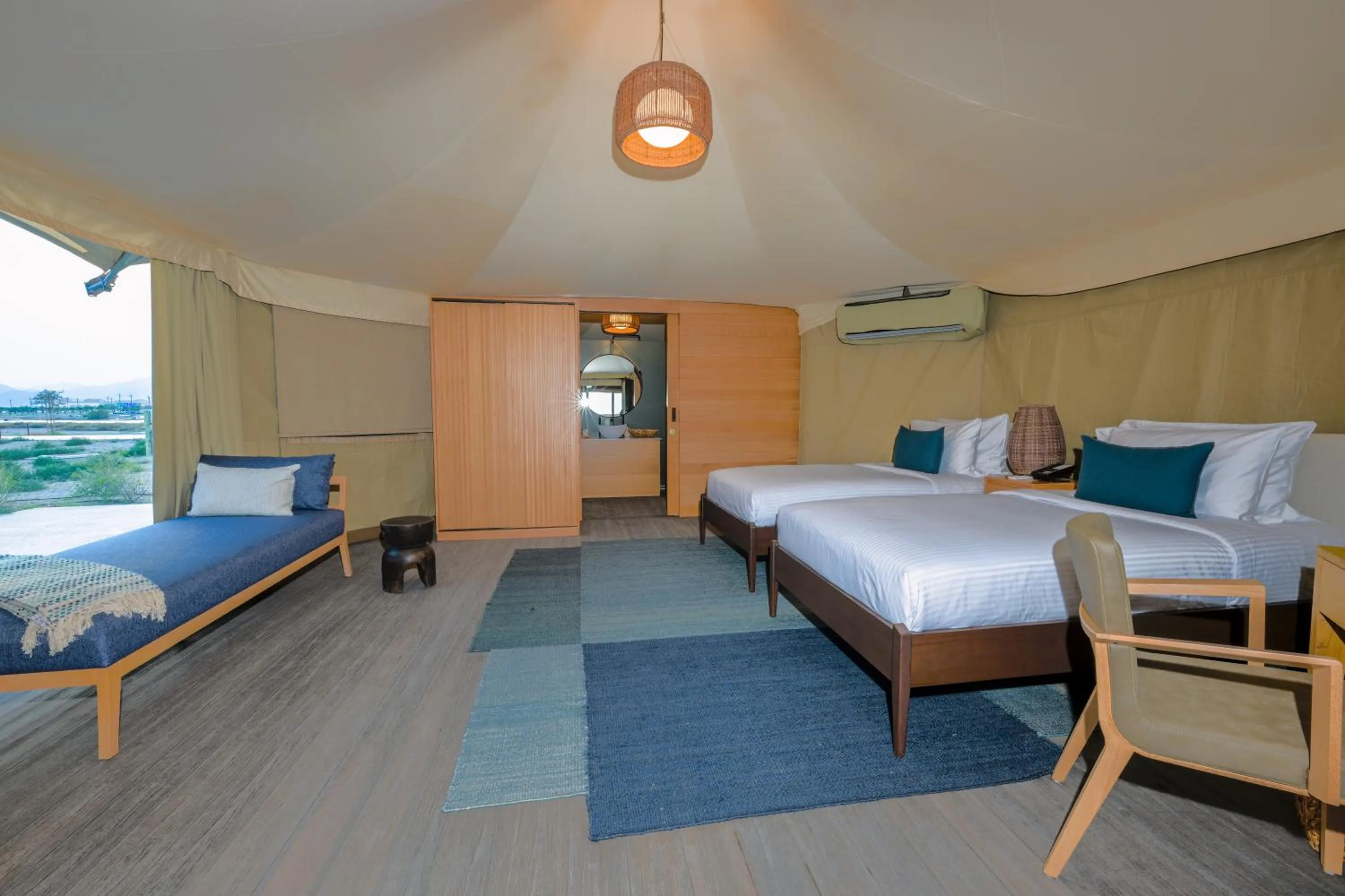 Bed in Kingfisher Retreat by Sharjah Collection