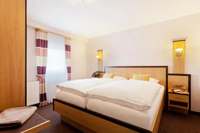 Photo of the whole room, Bed in Gästehaus Behle-Schäperken