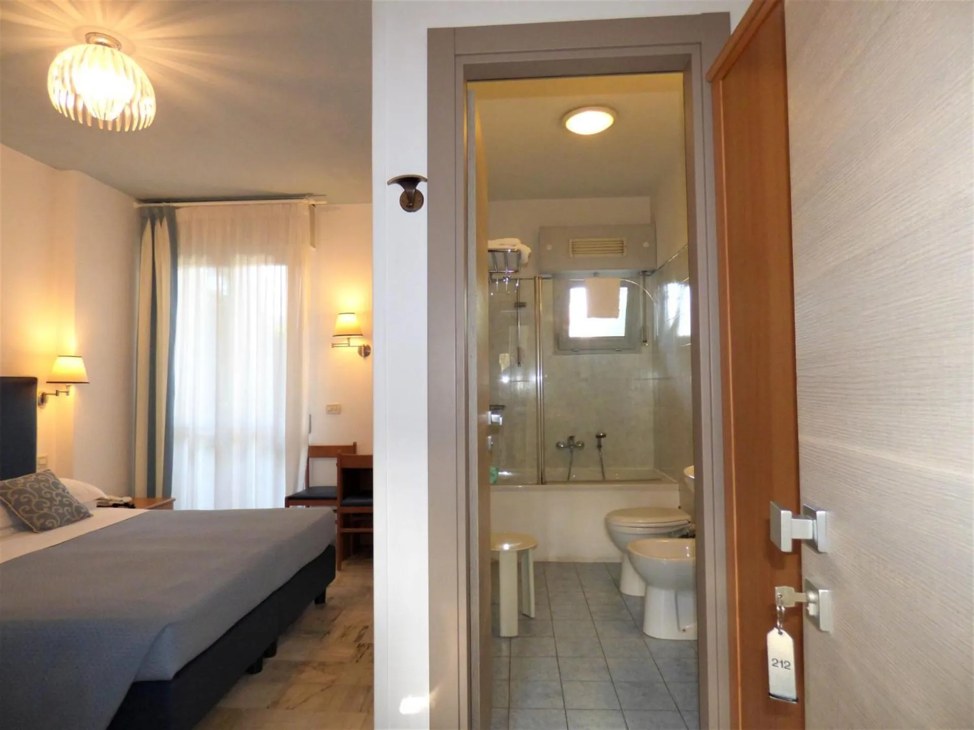 Bed in Hotel Giulio Cesare