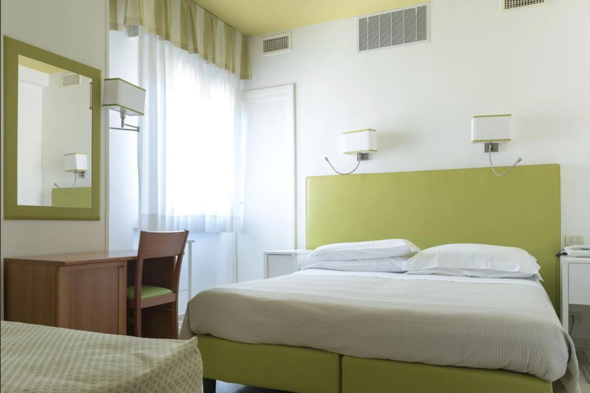 Bed in Hotel Giulio Cesare