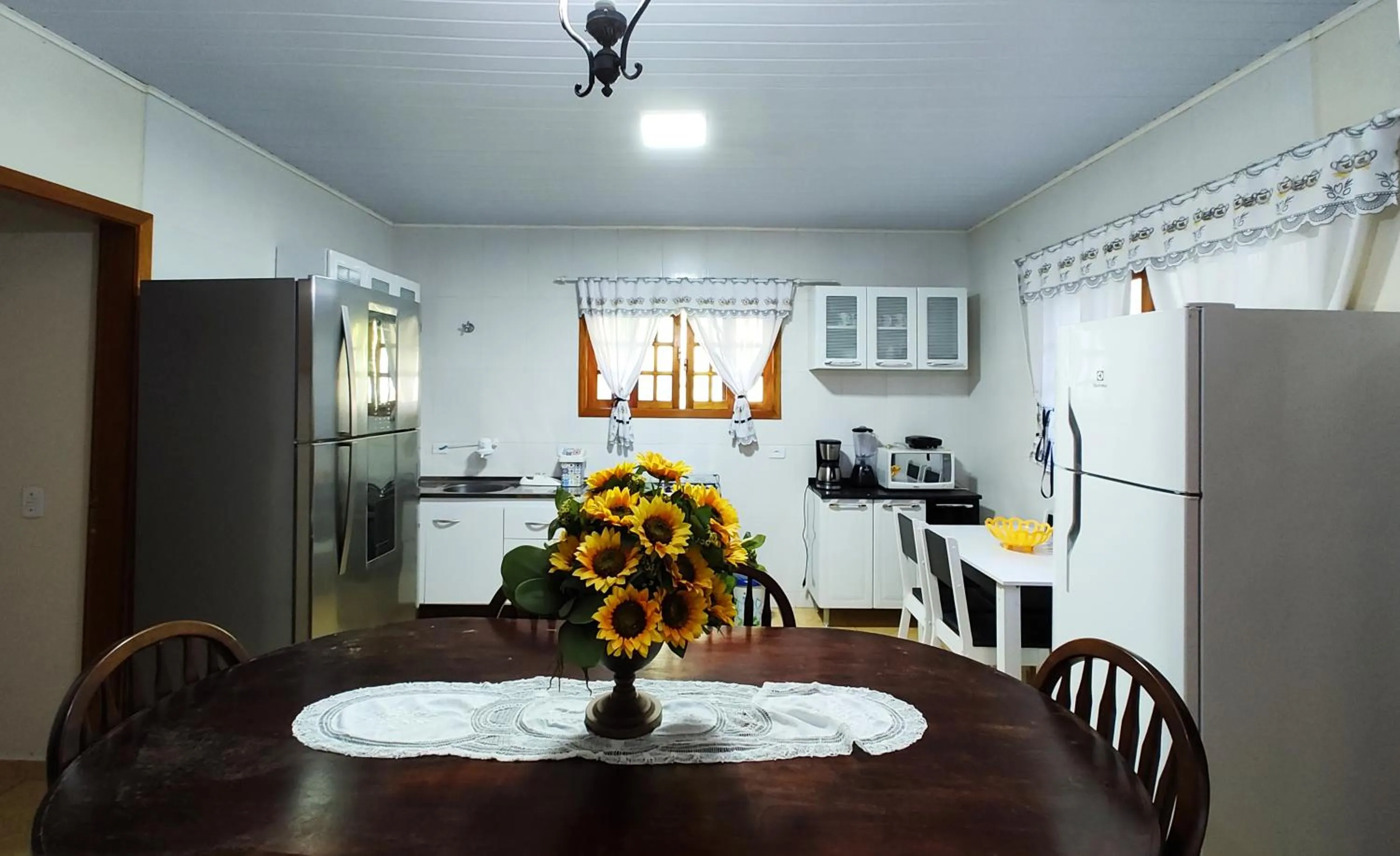 Kitchen or kitchenette in Pousada Casa dos Sonhos