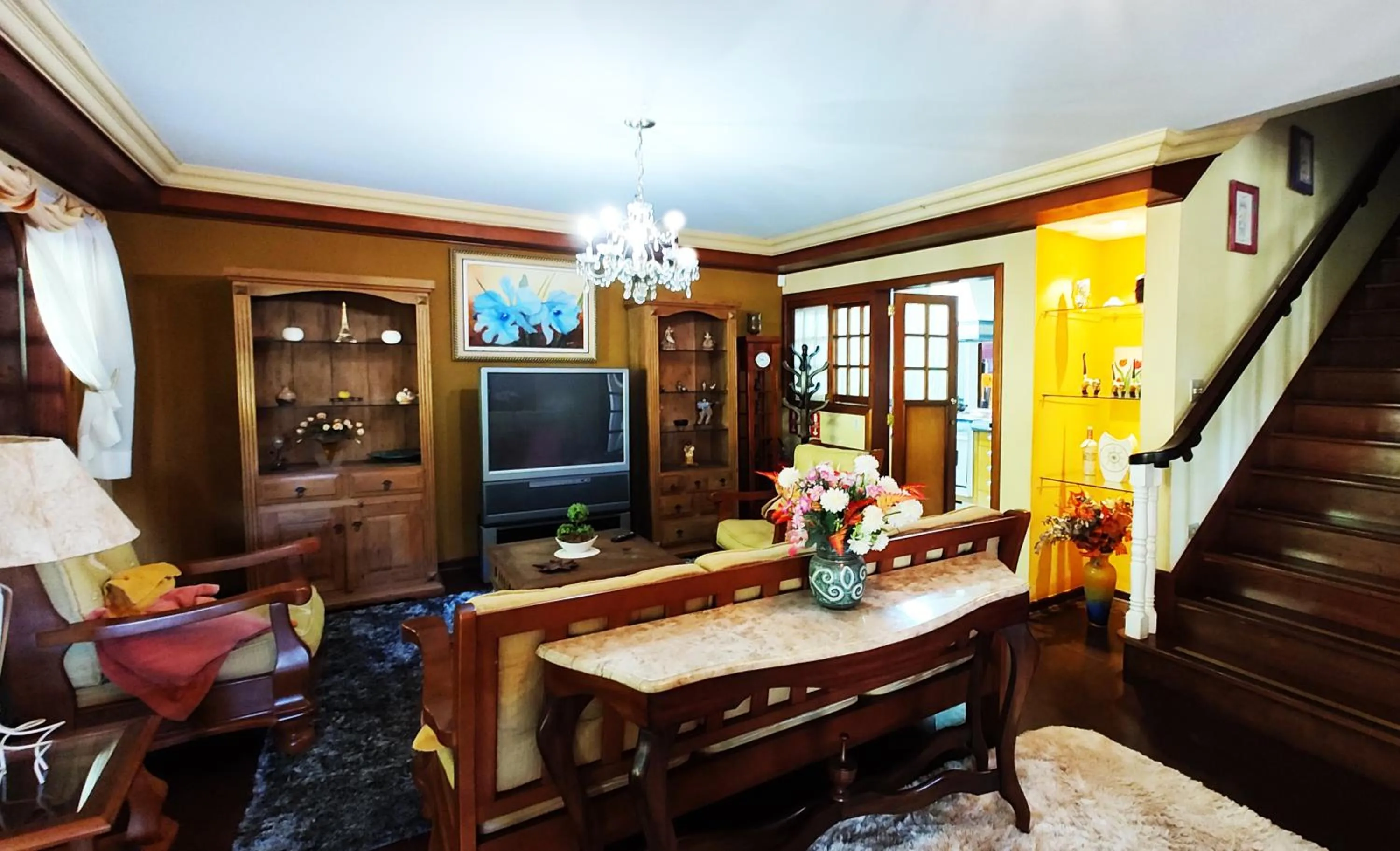 Communal lounge/ TV room in Pousada Casa dos Sonhos