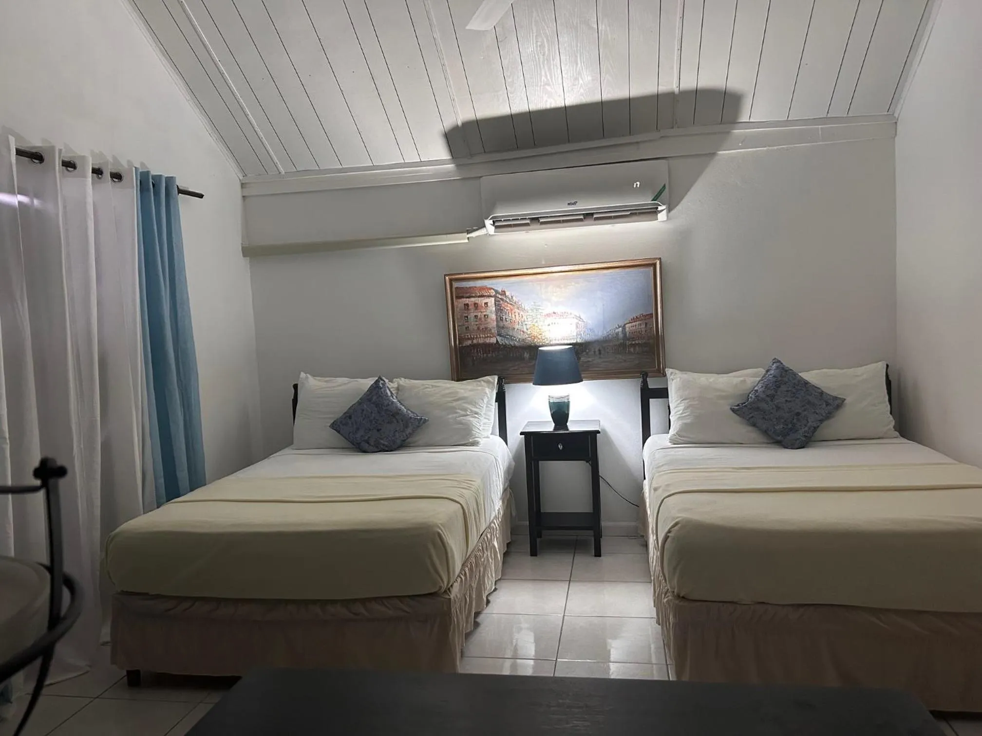 Bed in Firefly Beach Cottages