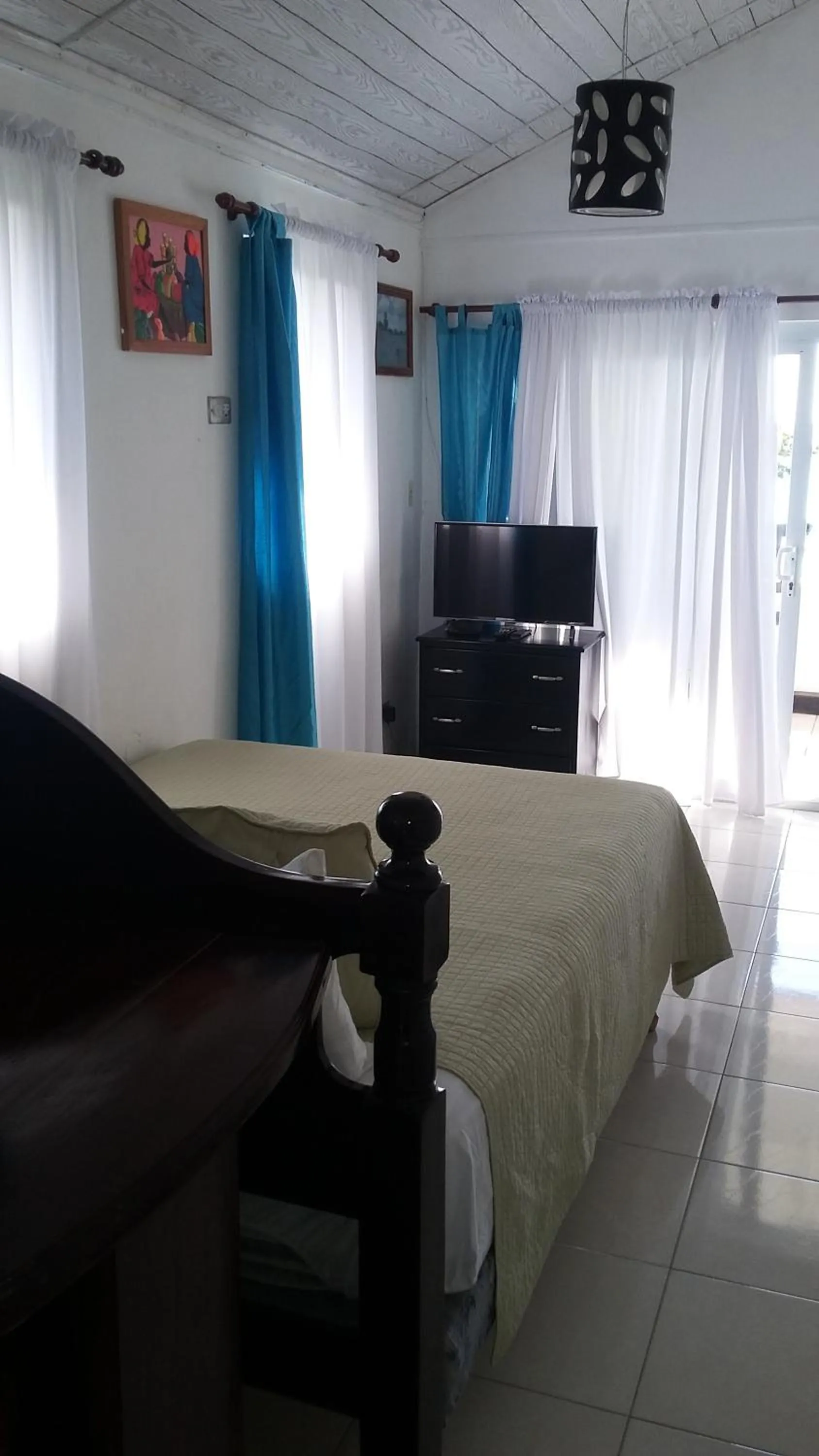 Bed in Firefly Beach Cottages