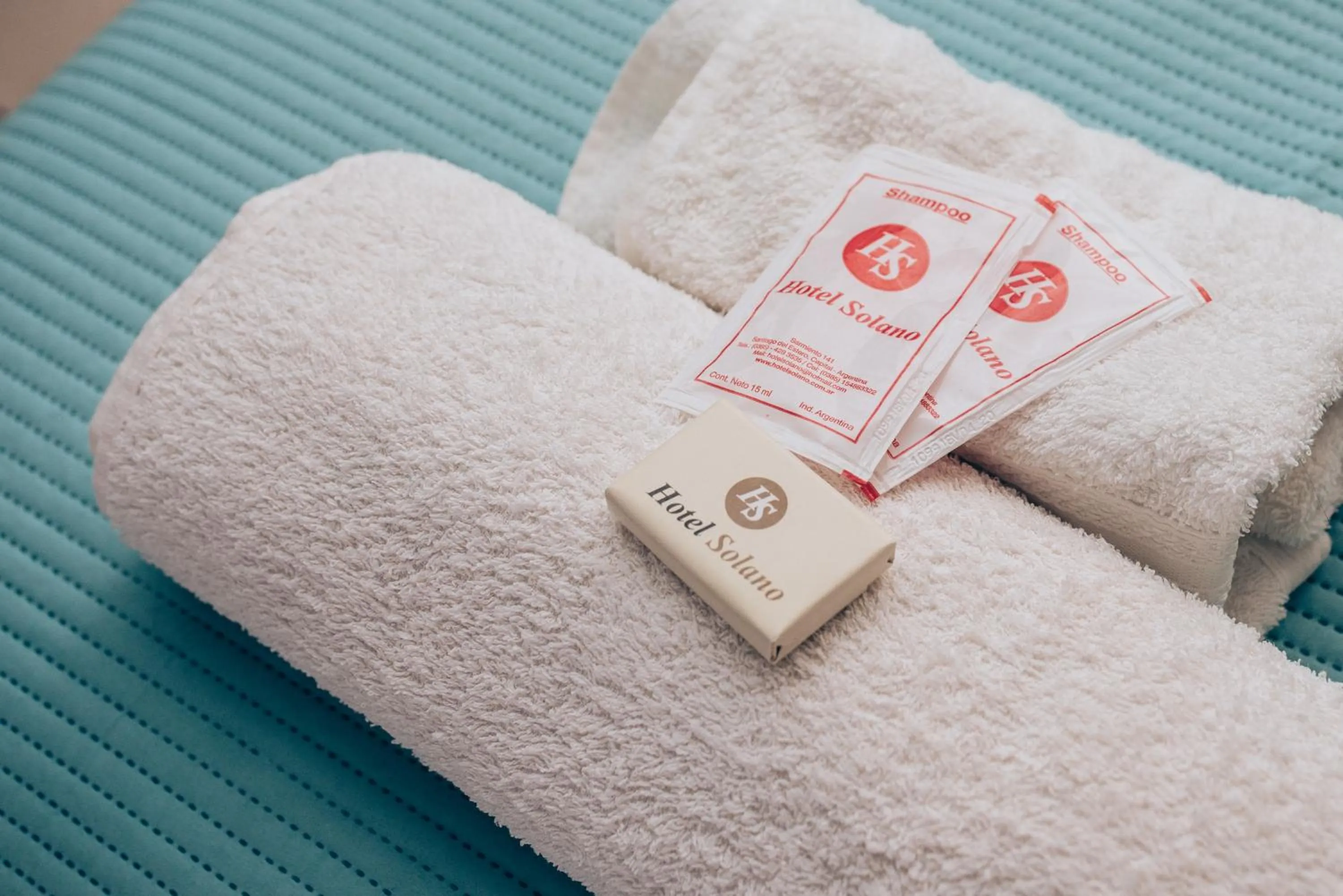 towels, Bed in Hotel Solano