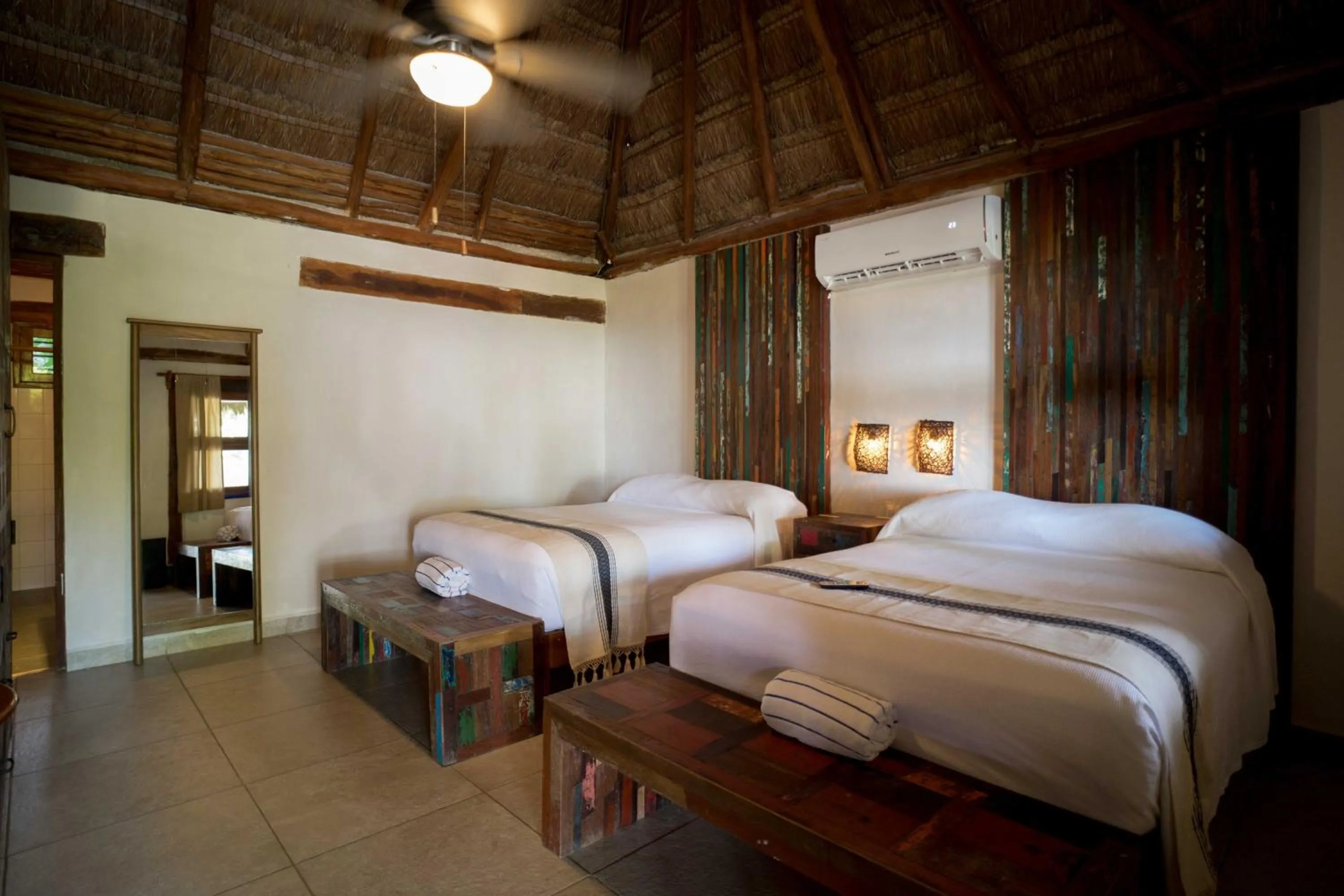 Bed in BT Live Tulum located at the party zone