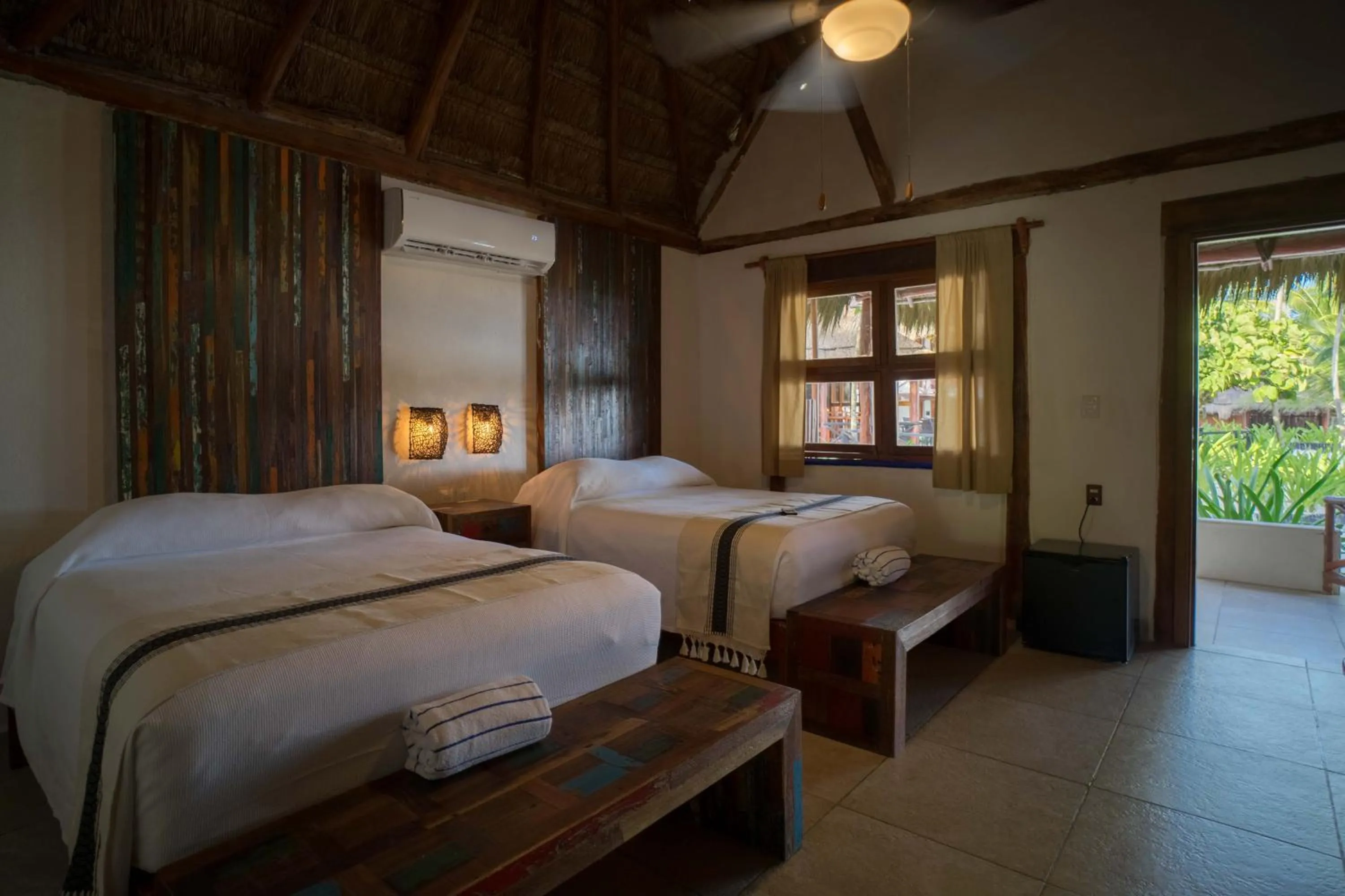 Bed in BT Live Tulum located at the party zone