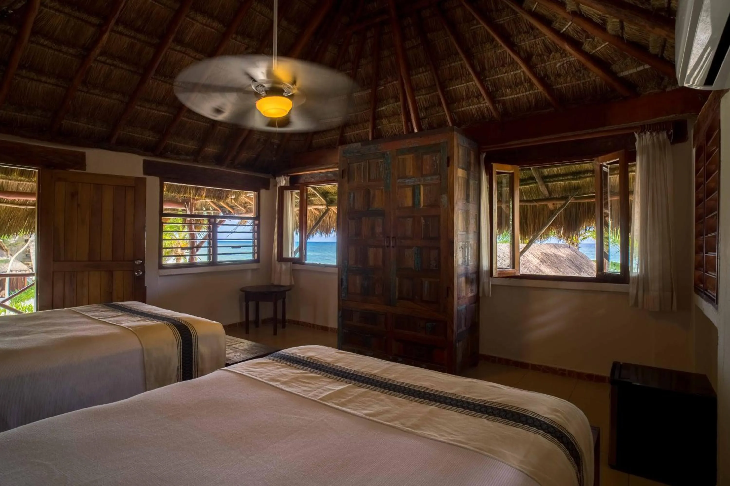 Bed in BT Live Tulum located at the party zone